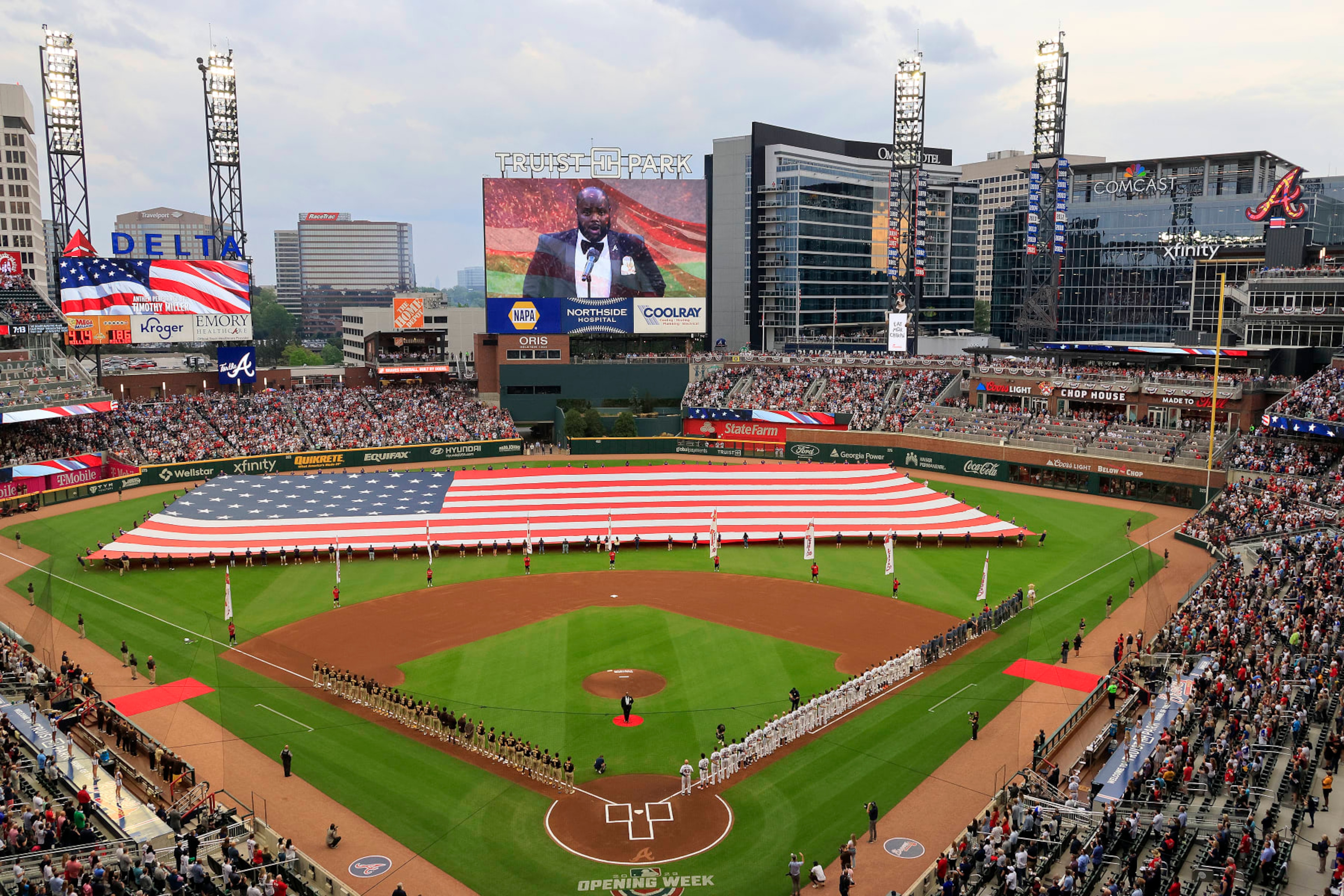 ATLANTA, GA - APRIL 06: The National Anthem is sung by Timothy Miller before the Braves 2023 home opener MLB game between the Atlanta Braves and the San Diego Padres on April 6, 2023 at Truist Park in Atlanta, Georgia. (Photo by David J. Griffin/Icon Sportswire via Getty Images) ATLANTA, GA - APRIL 06: The National Anthem is sung by Timothy Miller before the Braves 2023 home opener MLB game between the Atlanta Braves and the San Diego Padres on April 6, 2023 at Truist Park in Atlanta, Georgia. (Photo by David J. Griffin/Icon Sportswire via Getty Images)