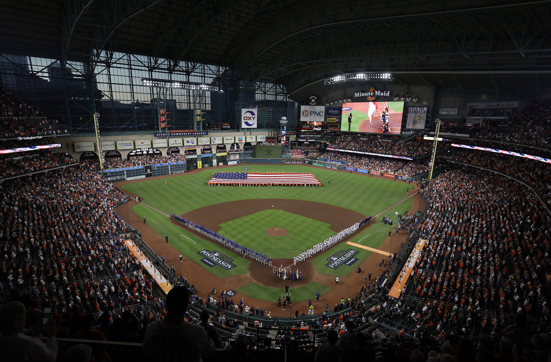 HOUSTON, TEXAS - OCTOBER 15: A general view inside Minute Maid Park as the national anthem is played before Game One of the American League Championship Series between the Houston Astros and the Texas Rangers on October 15, 2023 in Houston, Texas. (Photo by Carmen Mandato/Getty Images)