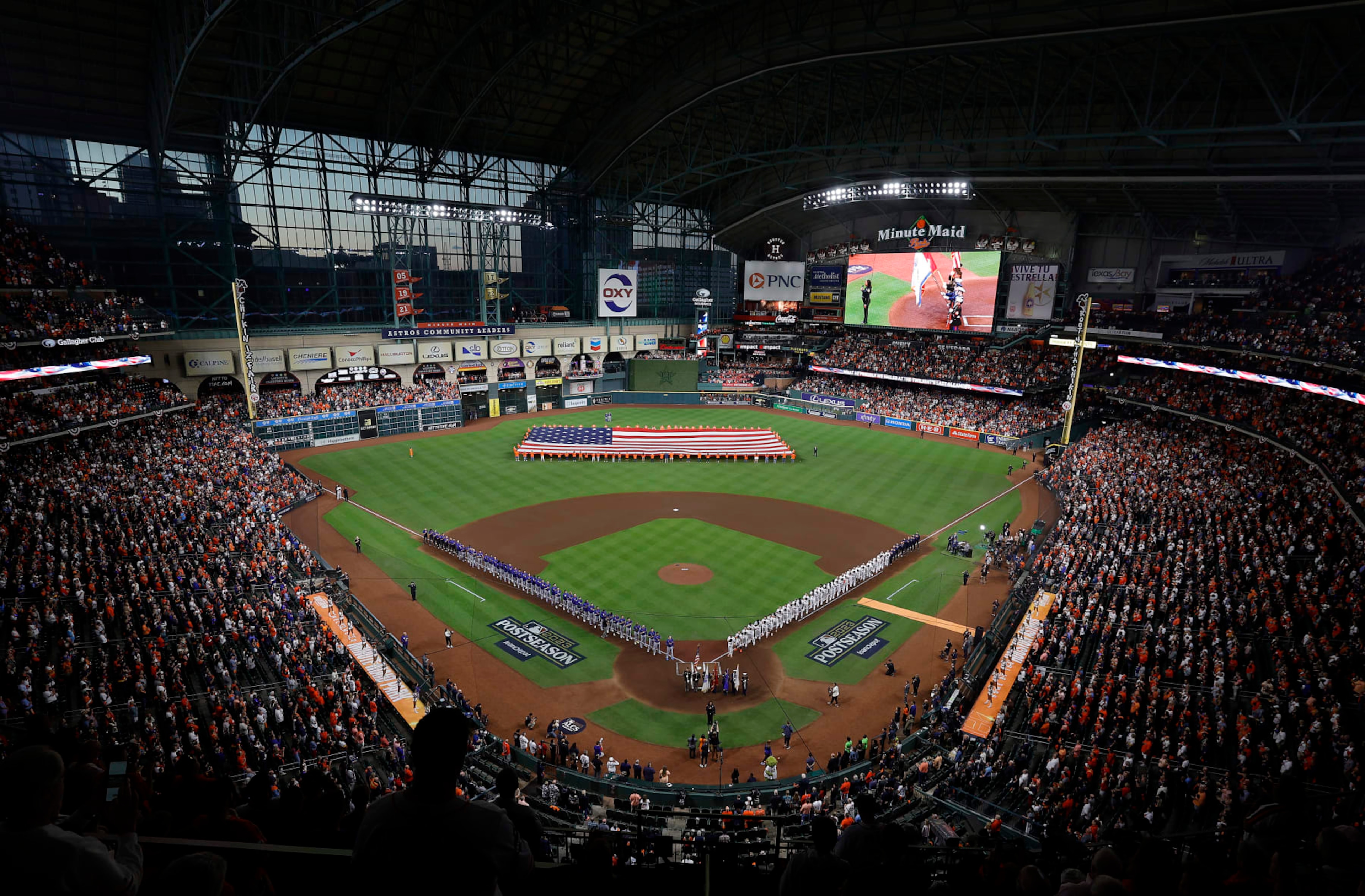 HOUSTON, TEXAS - OCTOBER 15: A general view inside Minute Maid Park as the national anthem is played before Game One of the American League Championship Series between the Houston Astros and the Texas Rangers on October 15, 2023 in Houston, Texas. (Photo by Carmen Mandato/Getty Images) HOUSTON, TEXAS - OCTOBER 15: A general view inside Minute Maid Park as the national anthem is played before Game One of the American League Championship Series between the Houston Astros and the Texas Rangers on October 15, 2023 in Houston, Texas. (Photo by Carmen Mandato/Getty Images)