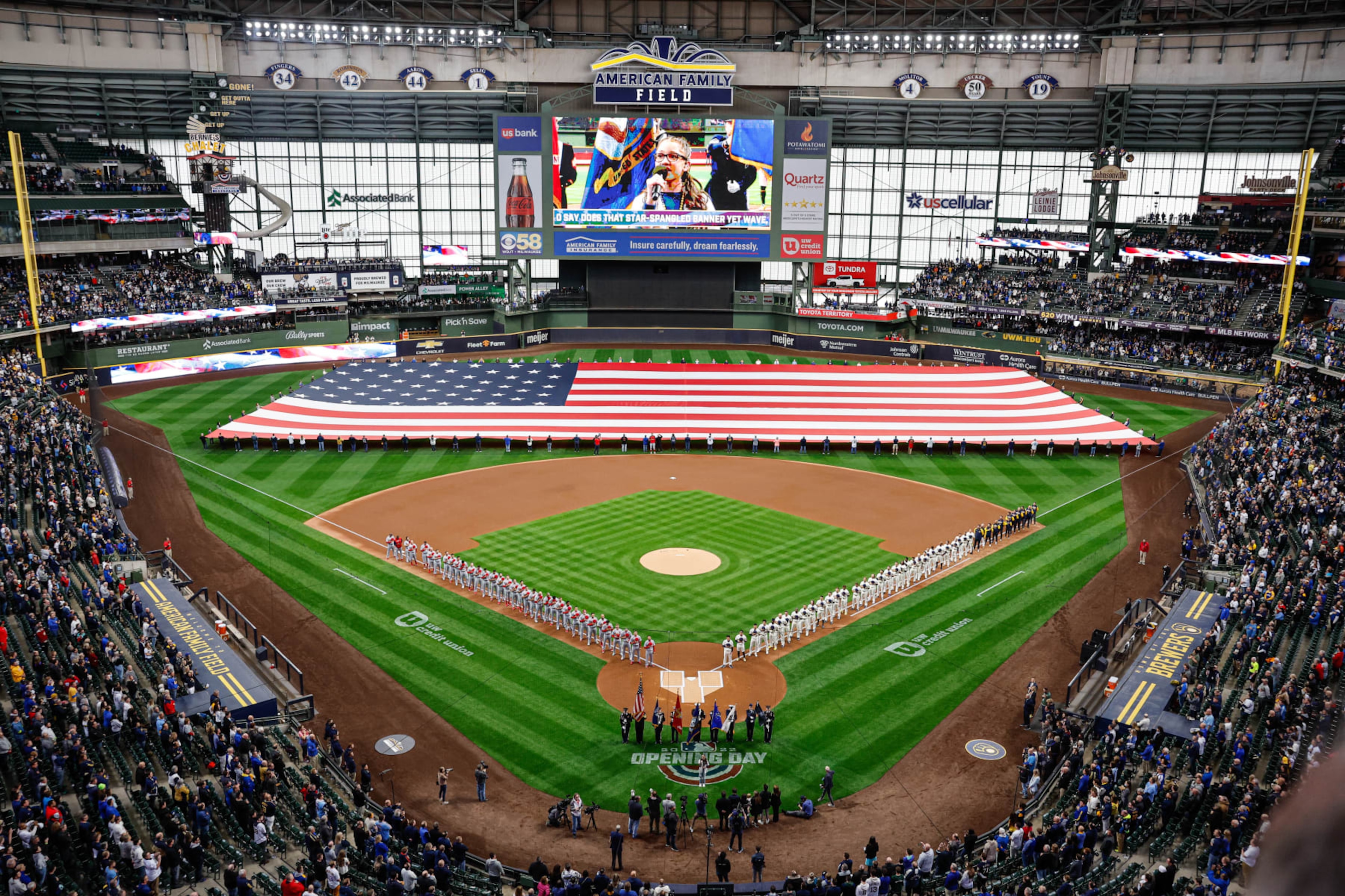MILWAUKEE, WI - APRIL 14: A general view of American Family Field during the National Anthem prior to the game between the St. Louis Cardinals and the Milwaukee Brewers at American Family Field on Thursday, April 14, 2022 in Milwaukee, Wisconsin. (Photo by Jeffrey Phelps/MLB Photos via Getty Images) MILWAUKEE, WI - APRIL 14: A general view of American Family Field during the National Anthem prior to the game between the St. Louis Cardinals and the Milwaukee Brewers at American Family Field on Thursday, April 14, 2022 in Milwaukee, Wisconsin. (Photo by Jeffrey Phelps/MLB Photos via Getty Images)