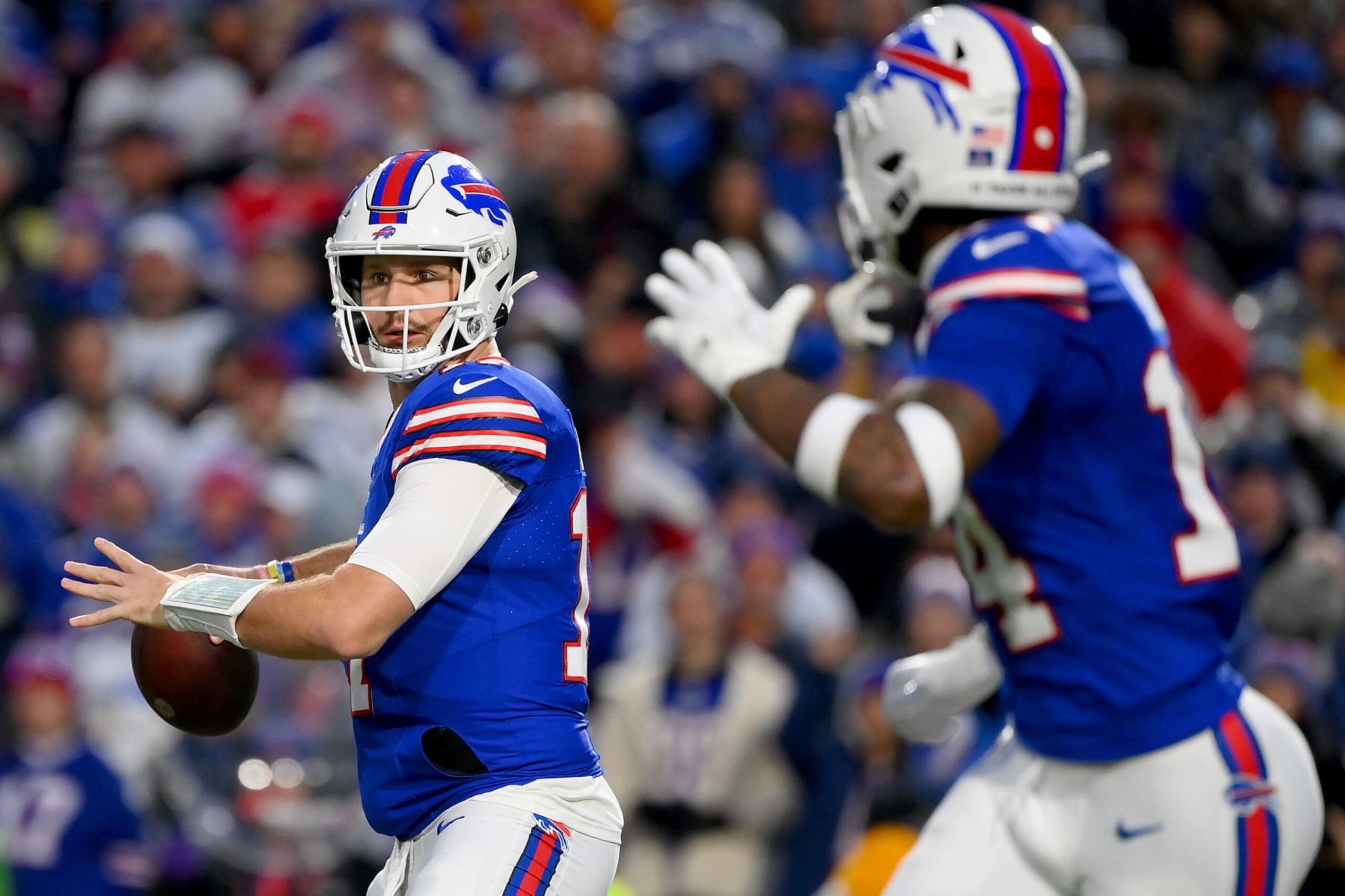 ORCHARD PARK, NEW YORK - DECEMBER 17: Josh Allen #17 of the Buffalo Bills attempts a pass while Stefon Diggs #14 of the Buffalo Bills runs a route during the first quarter against the Dallas Cowboys at Highmark Stadium on December 17, 2023 in Orchard Park, New York. (Photo by Rich Barnes/Getty Images) ORCHARD PARK, NEW YORK - DECEMBER 17: Josh Allen #17 of the Buffalo Bills attempts a pass while Stefon Diggs #14 of the Buffalo Bills runs a route during the first quarter against the Dallas Cowboys at Highmark Stadium on December 17, 2023 in Orchard Park, New York. (Photo by Rich Barnes/Getty Images)