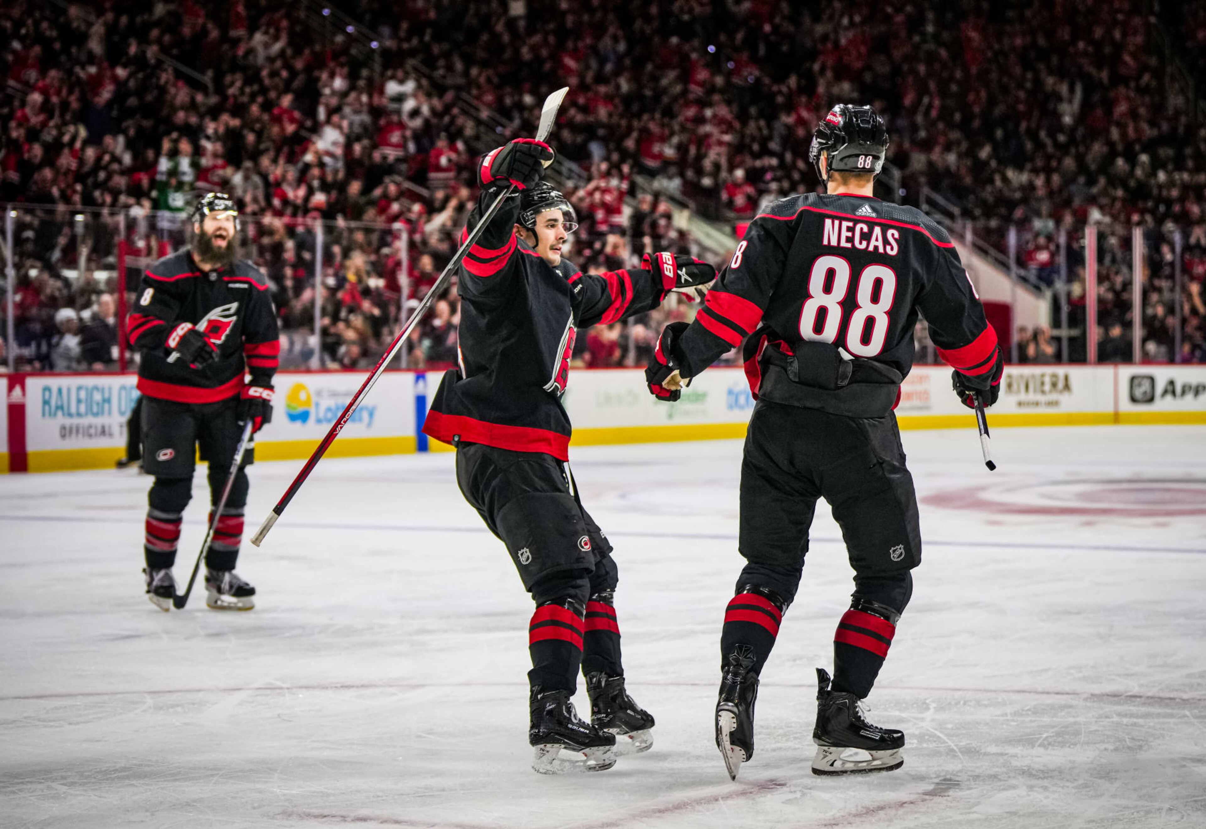 RALEIGH, NORTH CAROLINA - JANUARY 27: Martin Necas #88 of the Carolina Hurricanes celebrates with teammates after a goal during the second period against the Arizona Coyotes at PNC Arena on January 27, 2024 in Raleigh, North Carolina. (Photo by Josh Lavallee/NHLI via Getty Images) RALEIGH, NORTH CAROLINA - JANUARY 27: Martin Necas #88 of the Carolina Hurricanes celebrates with teammates after a goal during the second period against the Arizona Coyotes at PNC Arena on January 27, 2024 in Raleigh, North Carolina. (Photo by Josh Lavallee/NHLI via Getty Images)