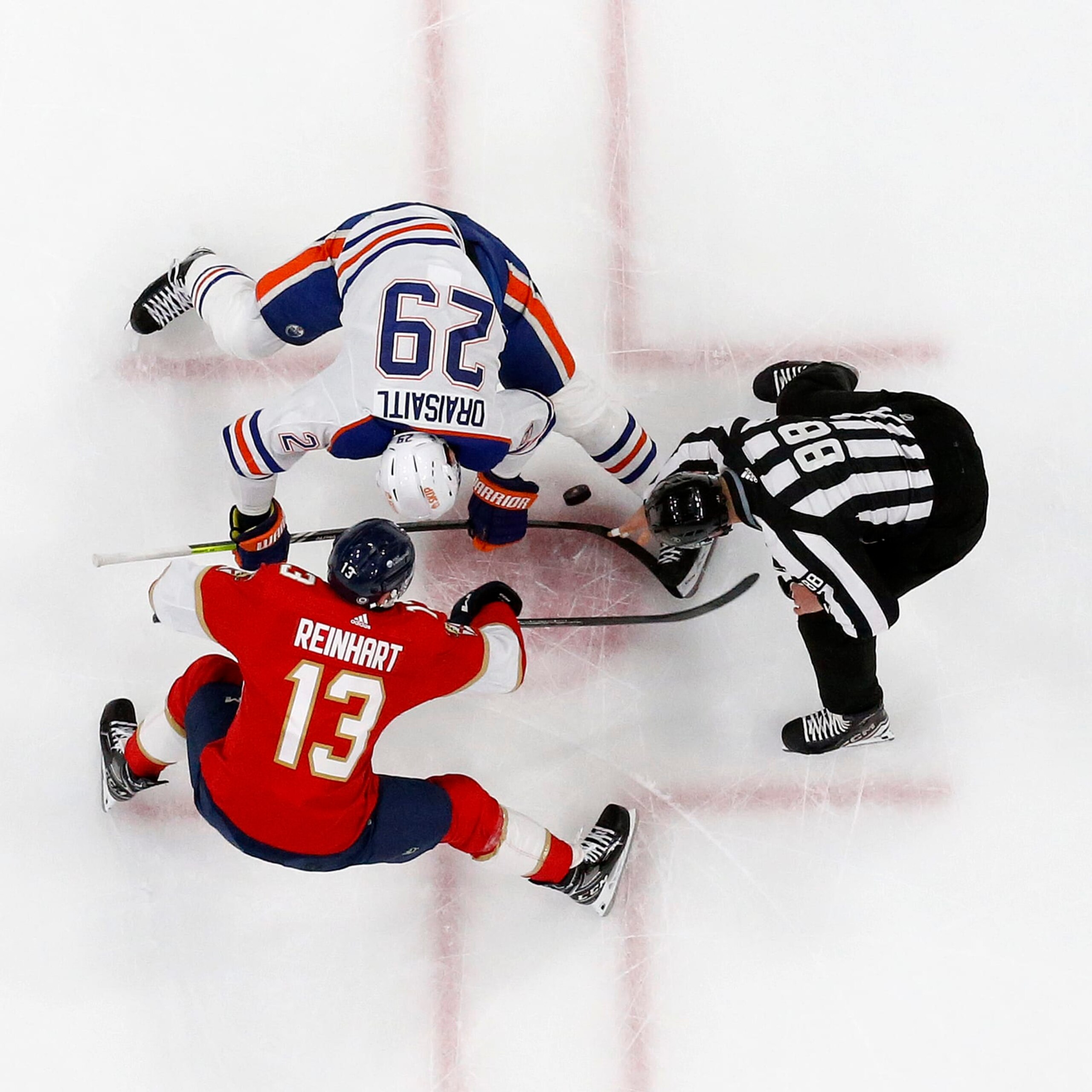 Edmonton Oilers forward Leon Draisaitl (top) and Florida Panthers forward Sam Reinhart face off iduring a Nov. 20, 2023 game. Edmonton Oilers forward Leon Draisaitl (top) and Florida Panthers forward Sam Reinhart face off iduring a Nov. 20, 2023 game.