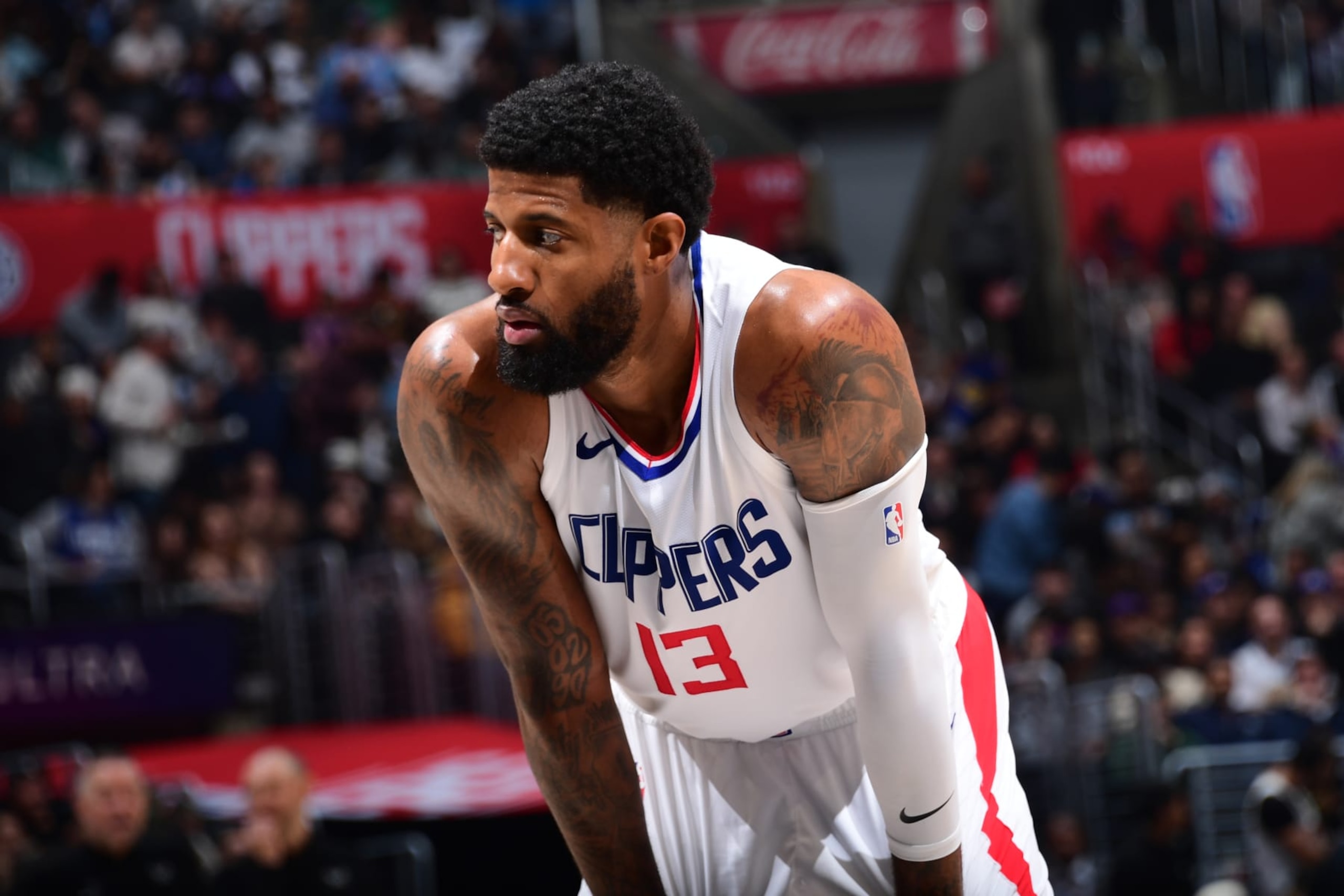 LOS ANGELES, CA - APRIL 4: Paul George #13 of the LA Clippers looks on during the game against the Denver Nuggets on April 4, 2024 at Crypto.Com Arena in Los Angeles, California. NOTE TO USER: User expressly acknowledges and agrees that, by downloading and/or using this Photograph, user is consenting to the terms and conditions of the Getty Images License Agreement. Mandatory Copyright Notice: Copyright 2024 NBAE (Photo by Adam Pantozzi/NBAE via Getty Images) LOS ANGELES, CA - APRIL 4: Paul George #13 of the LA Clippers looks on during the game against the Denver Nuggets on April 4, 2024 at Crypto.Com Arena in Los Angeles, California. NOTE TO USER: User expressly acknowledges and agrees that, by downloading and/or using this Photograph, user is consenting to the terms and conditions of the Getty Images License Agreement. Mandatory Copyright Notice: Copyright 2024 NBAE (Photo by Adam Pantozzi/NBAE via Getty Images)