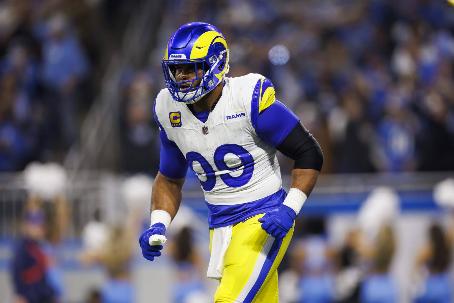 DETROIT, MICHIGAN - JANUARY 14: Aaron Donald #99 of the Los Angeles Rams runs off the field during an NFC Wild Card Playoff football game against the Detroit Lions at Ford Field on January 14, 2024 in Detroit, Michigan. (Photo by Ryan Kang/Getty Images)