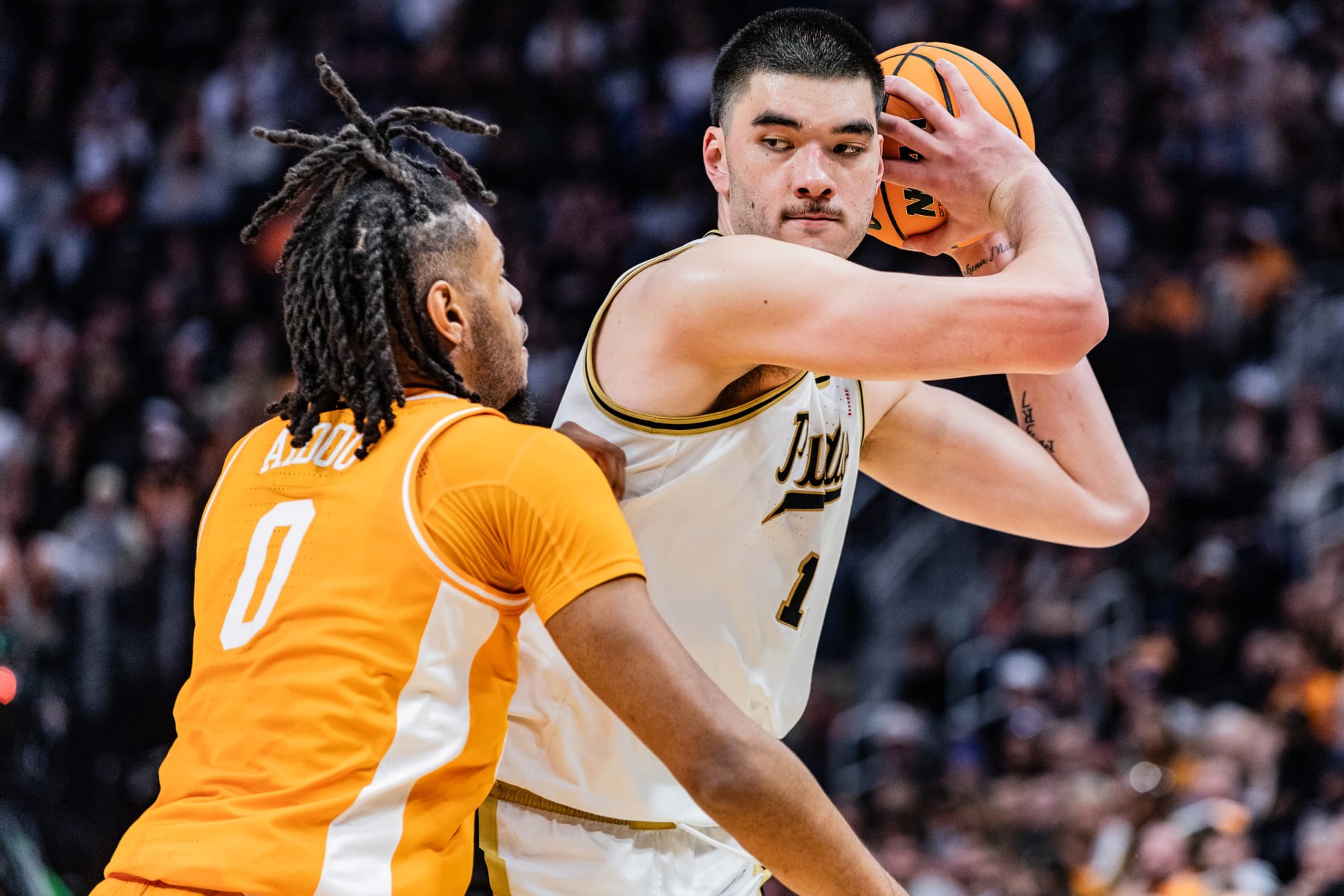 DETROIT, UNITED STATES - 2024/03/31: Zach Edey (R) of the Purdue Boilermakers in action against Jonas Aidoo (L) of the Tennessee Volunteers in the Elite Eight round of the NCAA Men's Basketball Tournament at Little Caesars Arena. Final score; Purdue 72-66 Tennessee. (Photo by Nicholas Muller/SOPA Images/LightRocket via Getty Images)