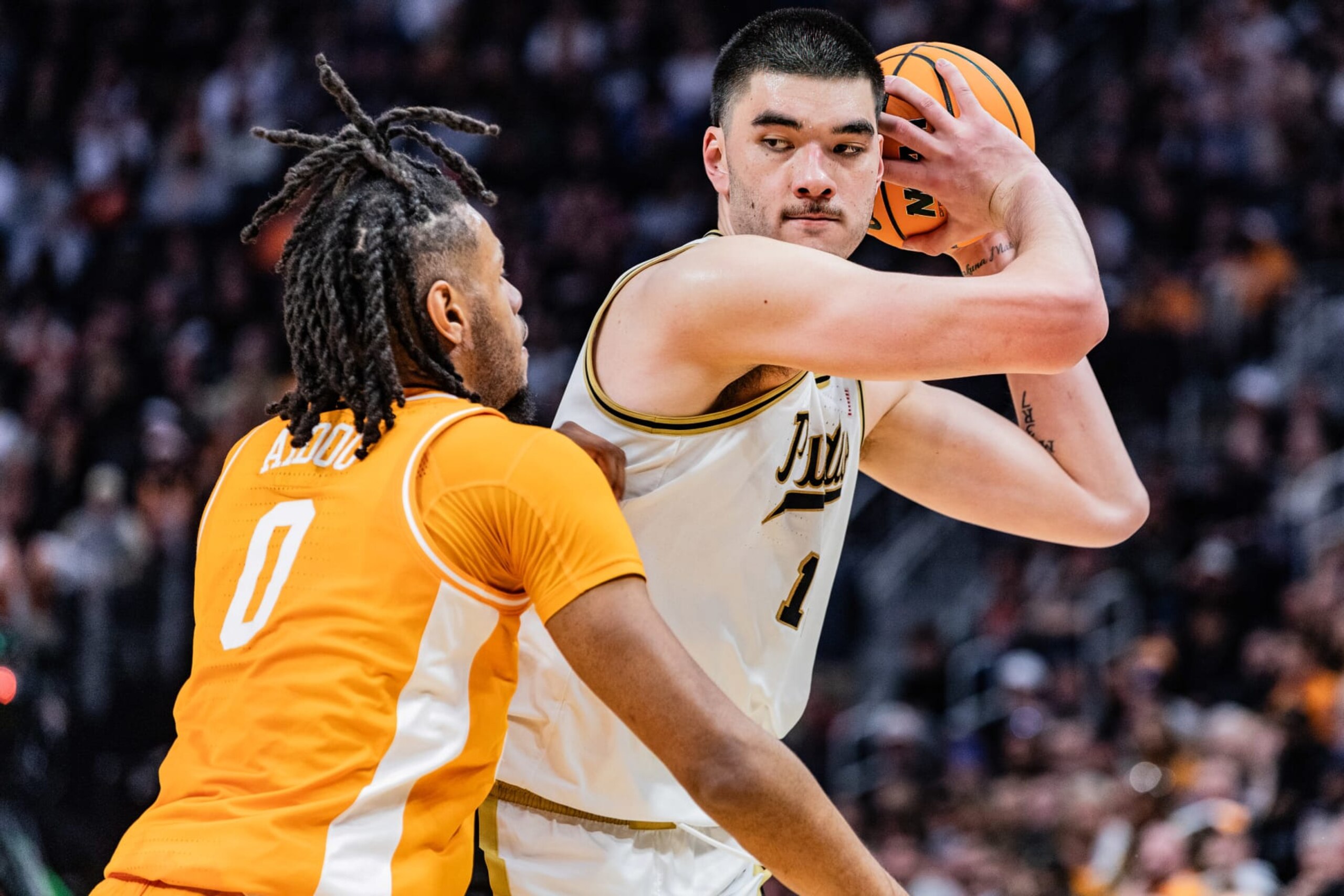 DETROIT, UNITED STATES - 2024/03/31: Zach Edey (R) of the Purdue Boilermakers in action against Jonas Aidoo (L) of the Tennessee Volunteers in the Elite Eight round of the NCAA Men's Basketball Tournament at Little Caesars Arena. Final score; Purdue 72-66 Tennessee. (Photo by Nicholas Muller/SOPA Images/LightRocket via Getty Images)