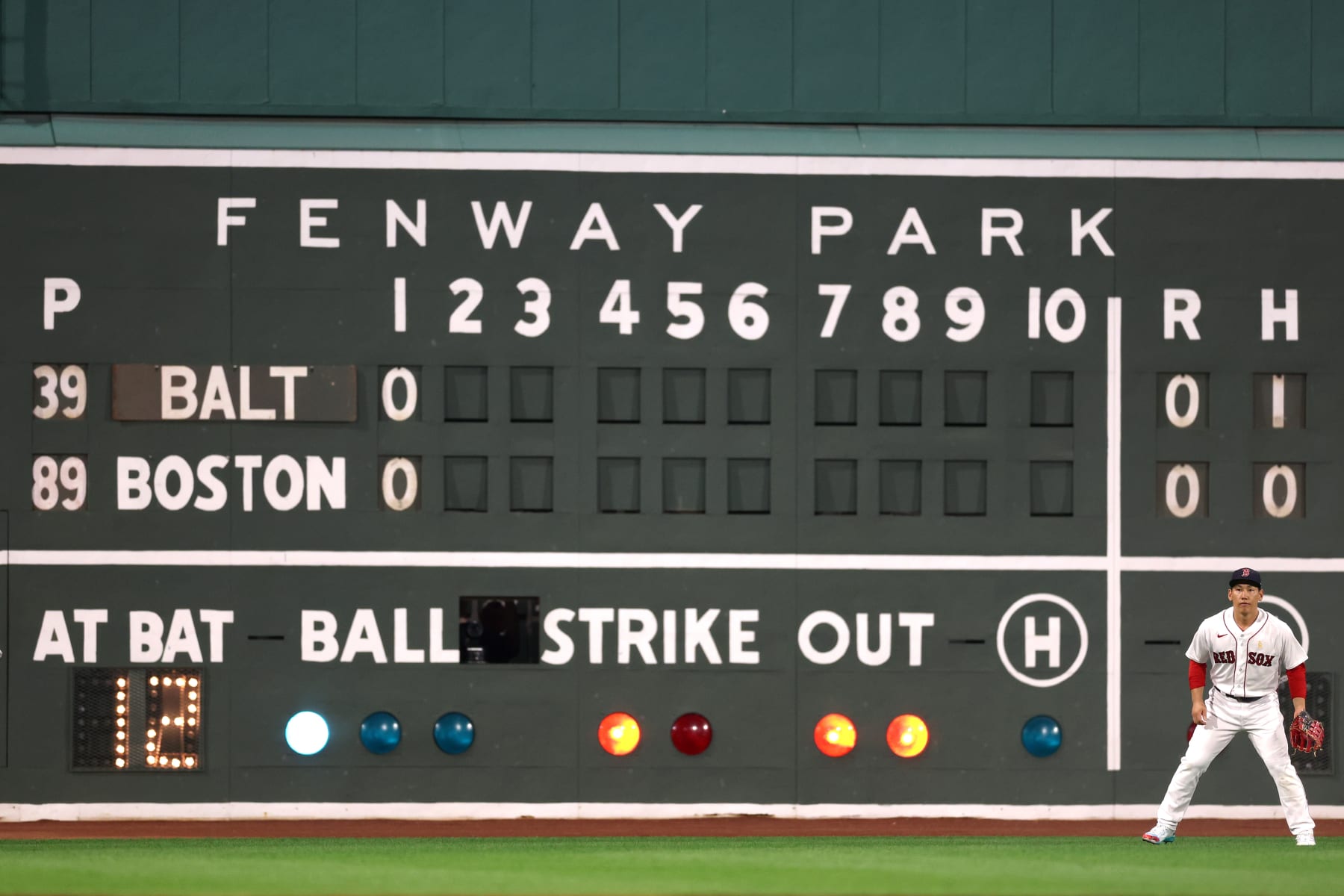 BOSTON, MASSACHUSETTS - SEPTEMBER 08: Masataka Yoshida #7 of the Boston Red Sox stands in front of the Green Monster during the second inning against the Baltimore Orioles at Fenway Park on September 08, 2023 in Boston, Massachusetts. (Photo by Maddie Meyer/Getty Images)