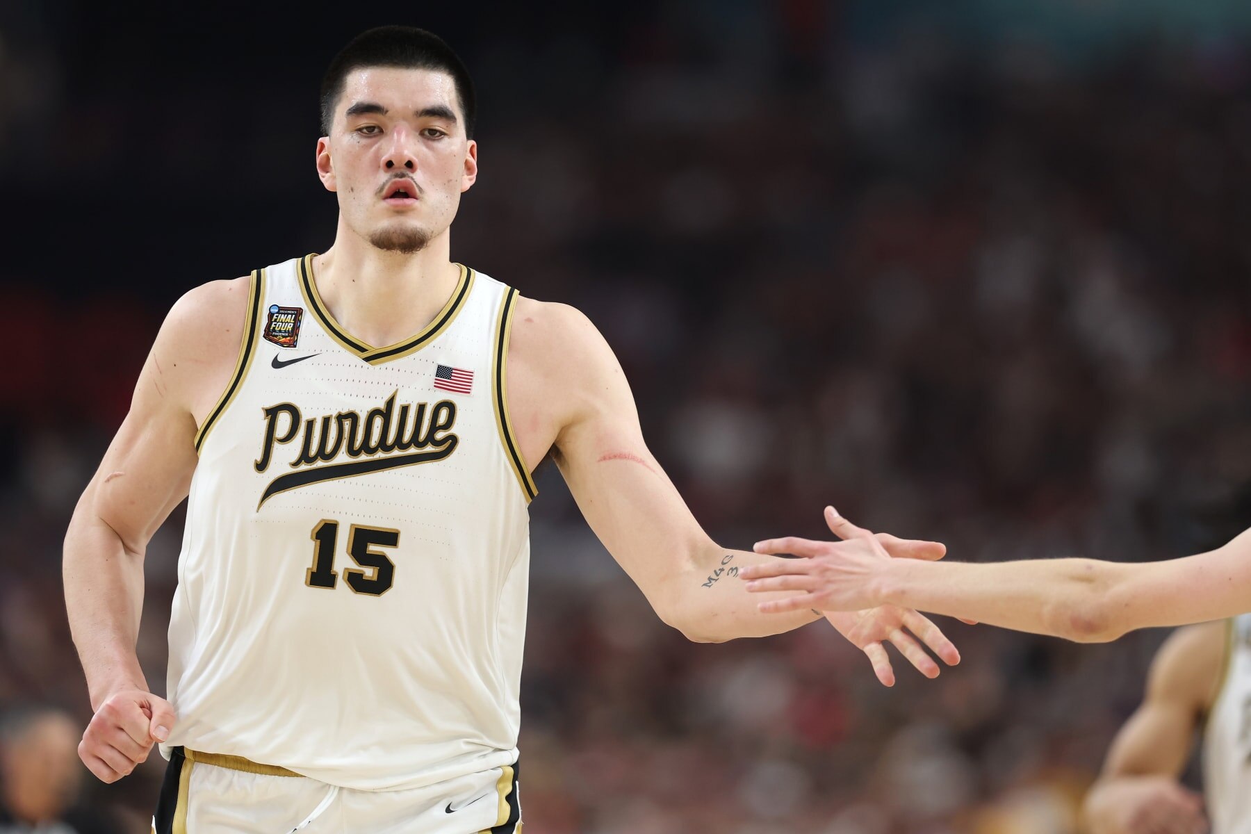 GLENDALE, ARIZONA - APRIL 06: Zach Edey #15 of the Purdue Boilermakers celebrates in the second half against the North Carolina State Wolfpack in the NCAA Men's Basketball Tournament Final Four semifinal game at State Farm Stadium on April 06, 2024 in Glendale, Arizona. (Photo by Christian Petersen/Getty Images)