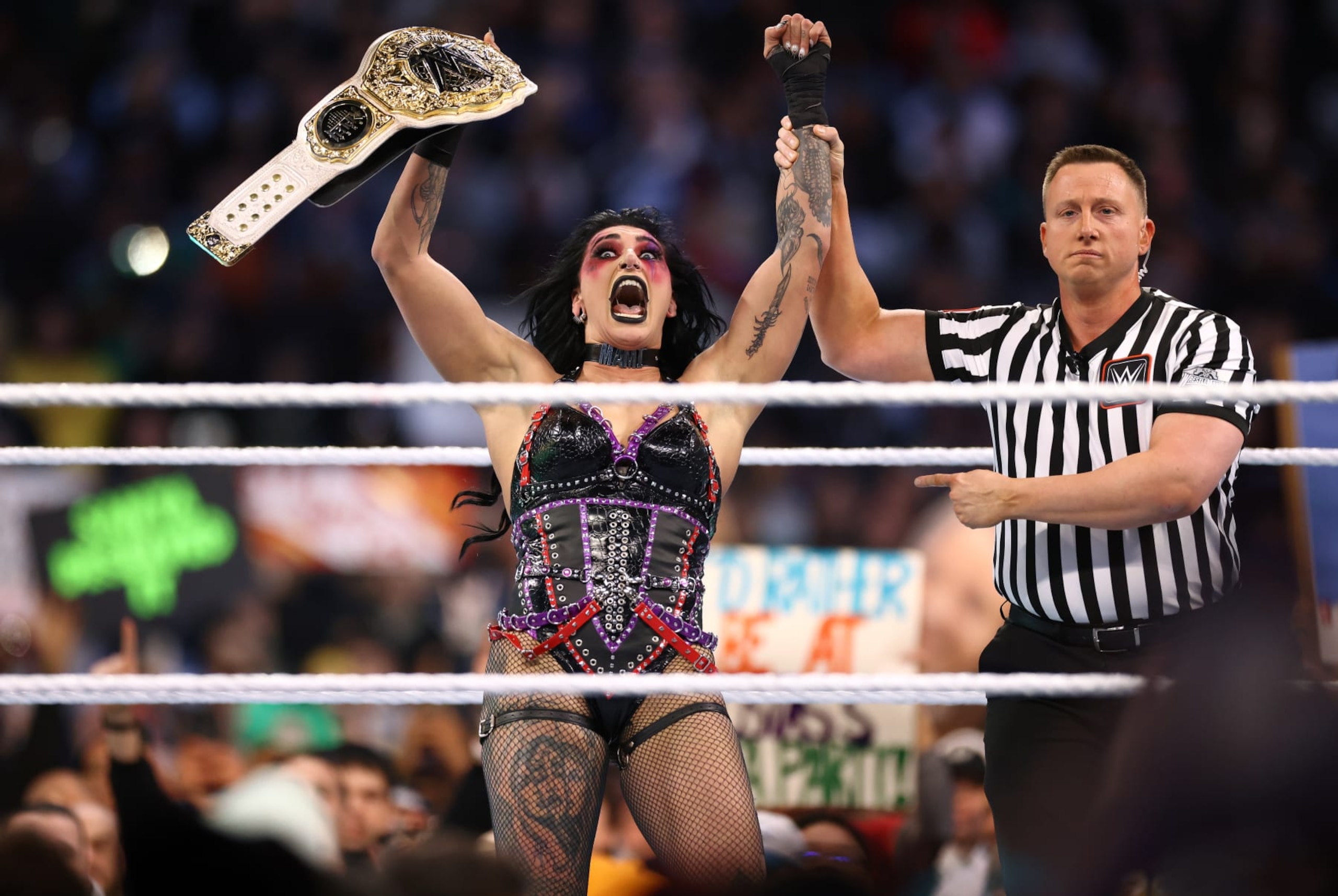 PHILADELPHIA, PENNSYLVANIA - APRIL 06: Rhea Ripley reacts after defeating Becky Lynch for the WWE Women's World Championship during Night One of WrestleMania 40 at Lincoln Financial Field on April 06, 2024 in Philadelphia, Pennsylvania. (Photo by Tim Nwachukwu/Getty Images) PHILADELPHIA, PENNSYLVANIA - APRIL 06: Rhea Ripley reacts after defeating Becky Lynch for the WWE Women's World Championship during Night One of WrestleMania 40 at Lincoln Financial Field on April 06, 2024 in Philadelphia, Pennsylvania. (Photo by Tim Nwachukwu/Getty Images)