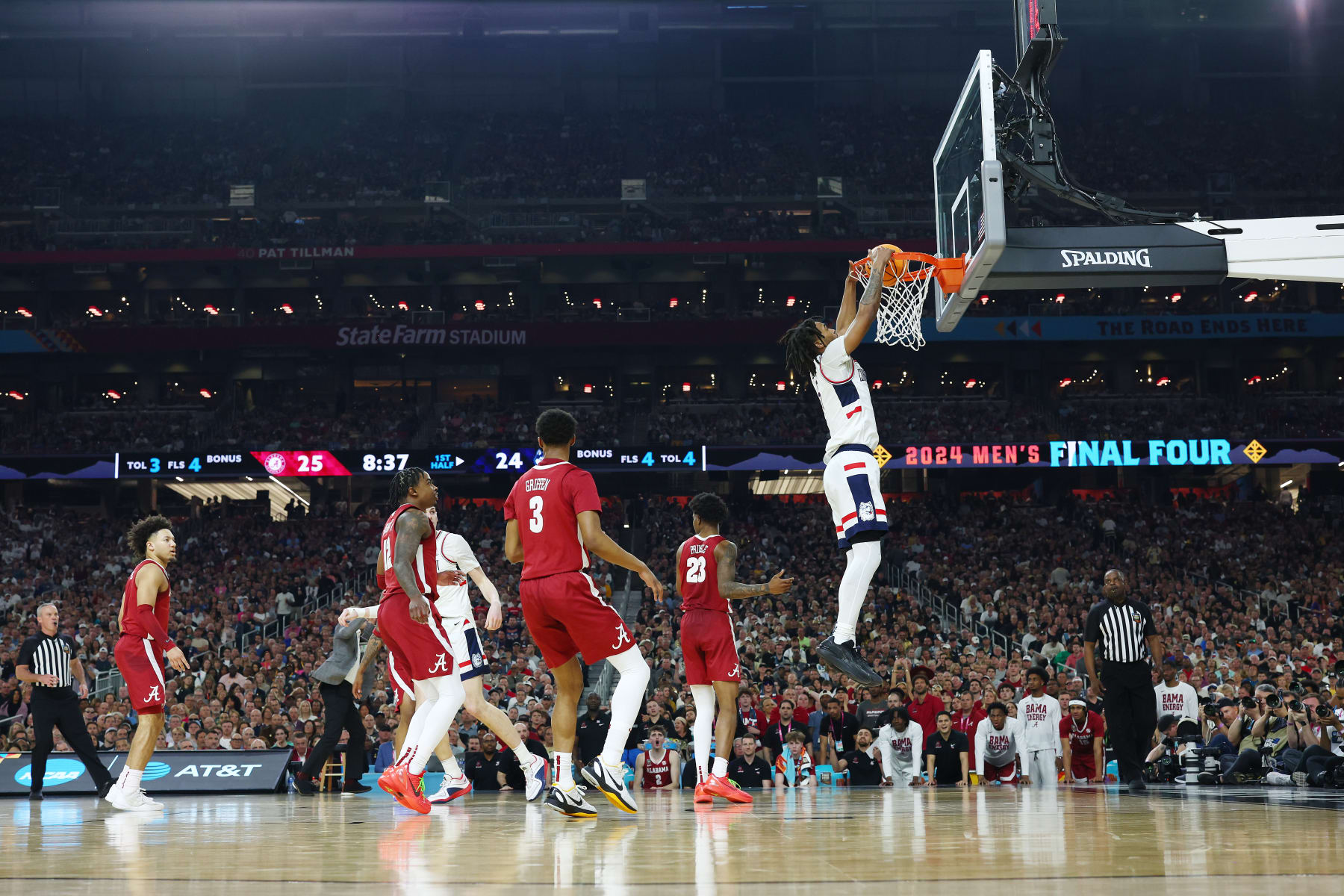 GLENDALE, ARIZONA - APRIL 06: Stephon Castle #5 of the Connecticut Huskies dunks during the first half in the NCAA Men’s Basketball Tournament Final Four semifinal game against the Alabama Crimson Tide at State Farm Stadium on April 06, 2024 in Glendale, Arizona. (Photo by Brett Wilhelm/NCAA Photos via Getty Images)