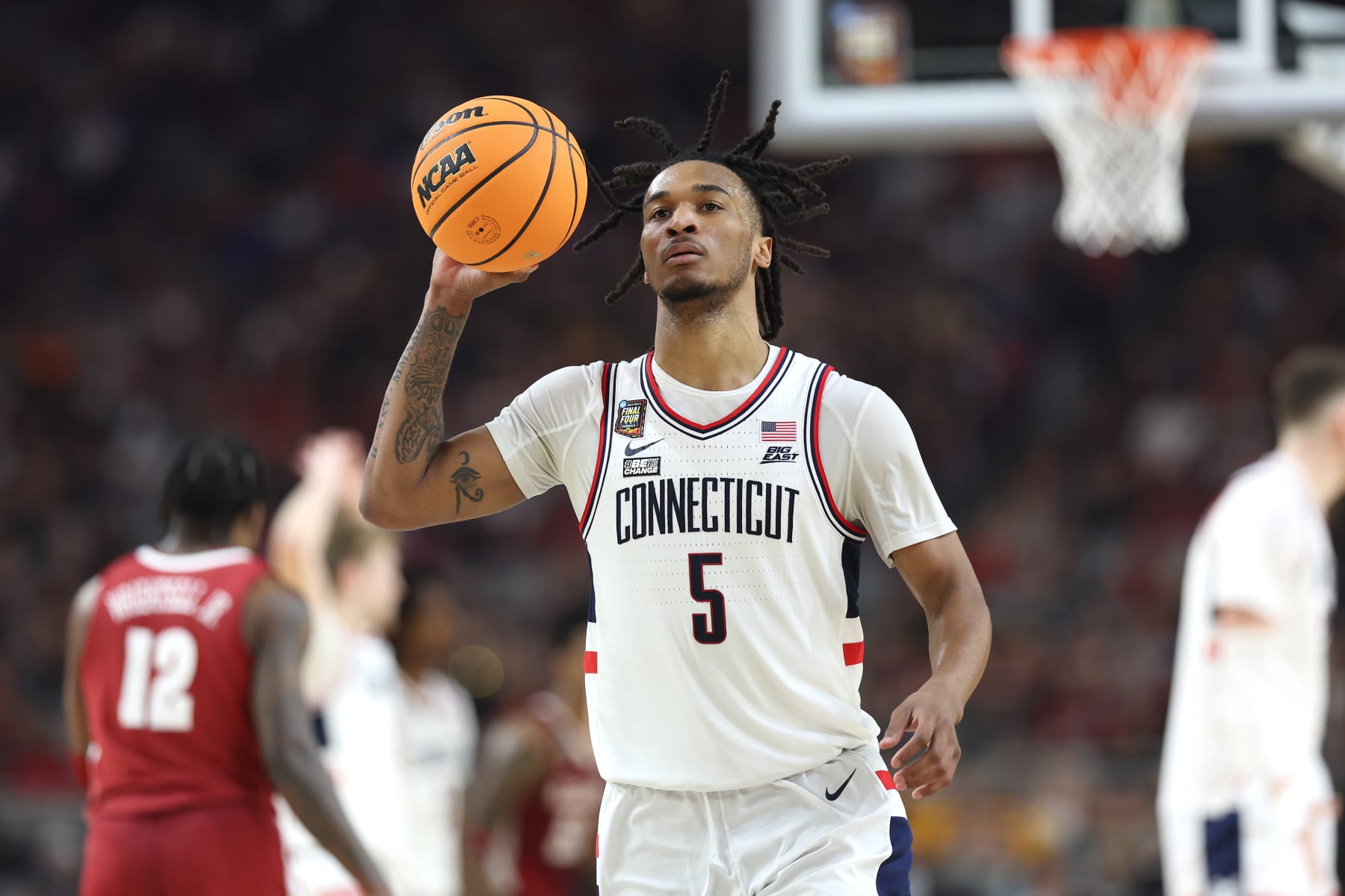 GLENDALE, ARIZONA - APRIL 06: Stephon Castle #5 of the Connecticut Huskies reacts in the first half against the Alabama Crimson Tide in the NCAA Men's Basketball Tournament Final Four semifinal game at State Farm Stadium on April 06, 2024 in Glendale, Arizona. (Photo by Jamie Squire/Getty Images)