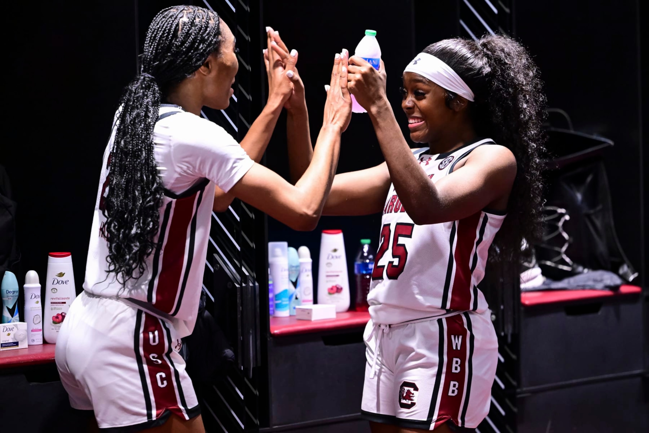 CLEVELAND, OHIO - APRIL 5: Raven Johnson #25 of the South Carolina Gamecocks and Bree Hall #23 of the South Carolina Gamecocks celebrate in the locker room after the game against the NC State Wolfpack during the NCAA Women's Basketball Tournament Final Four semifinal game at Rocket Mortgage Fieldhouse on April 5, 2024 in Cleveland, Ohio. (Photo by Ben Solomon/NCAA Photos via Getty Images) CLEVELAND, OHIO - APRIL 5: Raven Johnson #25 of the South Carolina Gamecocks and Bree Hall #23 of the South Carolina Gamecocks celebrate in the locker room after the game against the NC State Wolfpack during the NCAA Women's Basketball Tournament Final Four semifinal game at Rocket Mortgage Fieldhouse on April 5, 2024 in Cleveland, Ohio. (Photo by Ben Solomon/NCAA Photos via Getty Images)