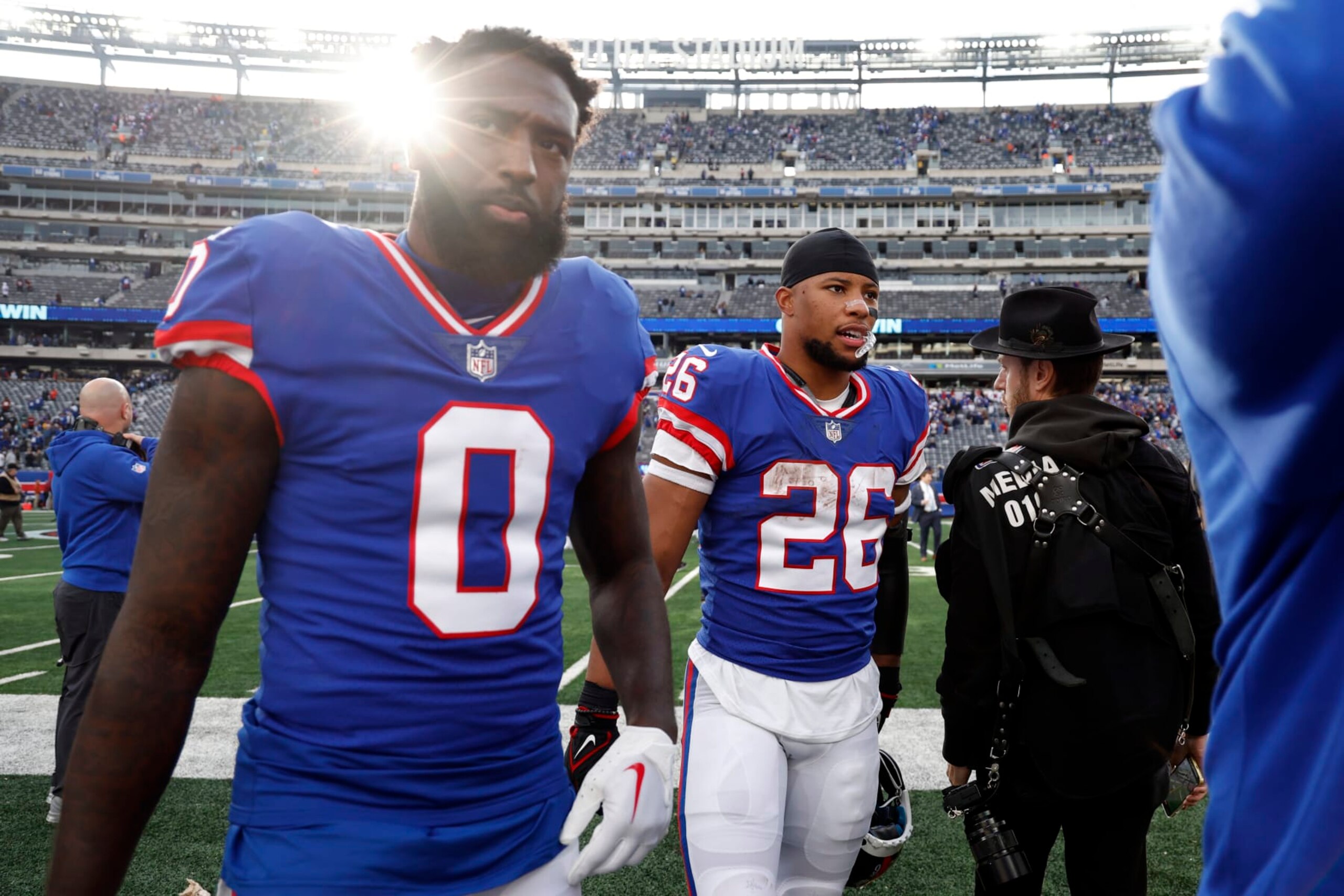 EAST RUTHERFORD, NEW JERSEY - OCTOBER 22: Parris Campbell #0 and Saquon Barkley #26 of the New York Giants look on after the game against the Washington Commanders at MetLife Stadium on October 22, 2023 in East Rutherford, New Jersey. (Photo by Sarah Stier/Getty Images)