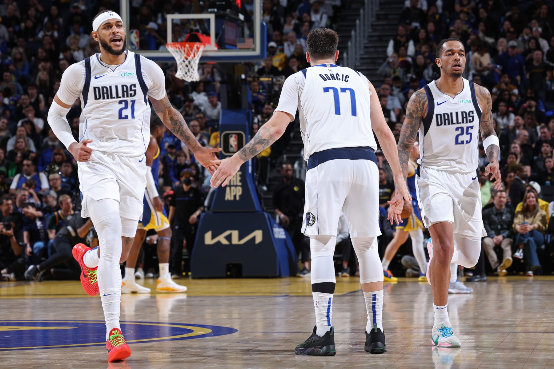 Daniel Gafford, Luka DonÄiÄ and P.J. Washington