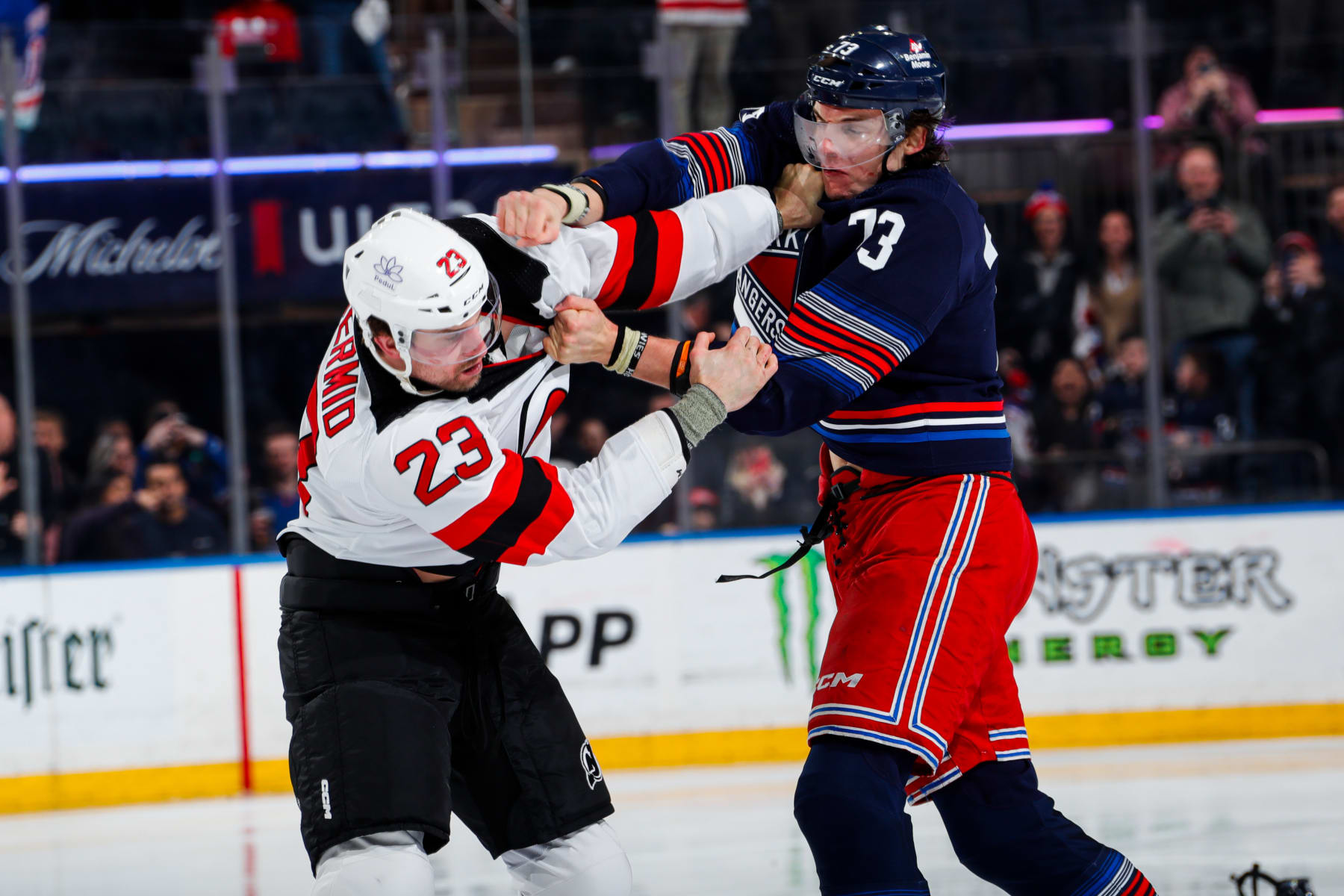 NEW YORK, NEW YORK - APRIL 03:  Matt Rempe #73 of the New York Rangers fights Kurtis MacDermid #23 of the New Jersey Devils at Madison Square Garden on April 3, 2024 in New York City. (Photo by Jared Silber/NHLI via Getty Images)