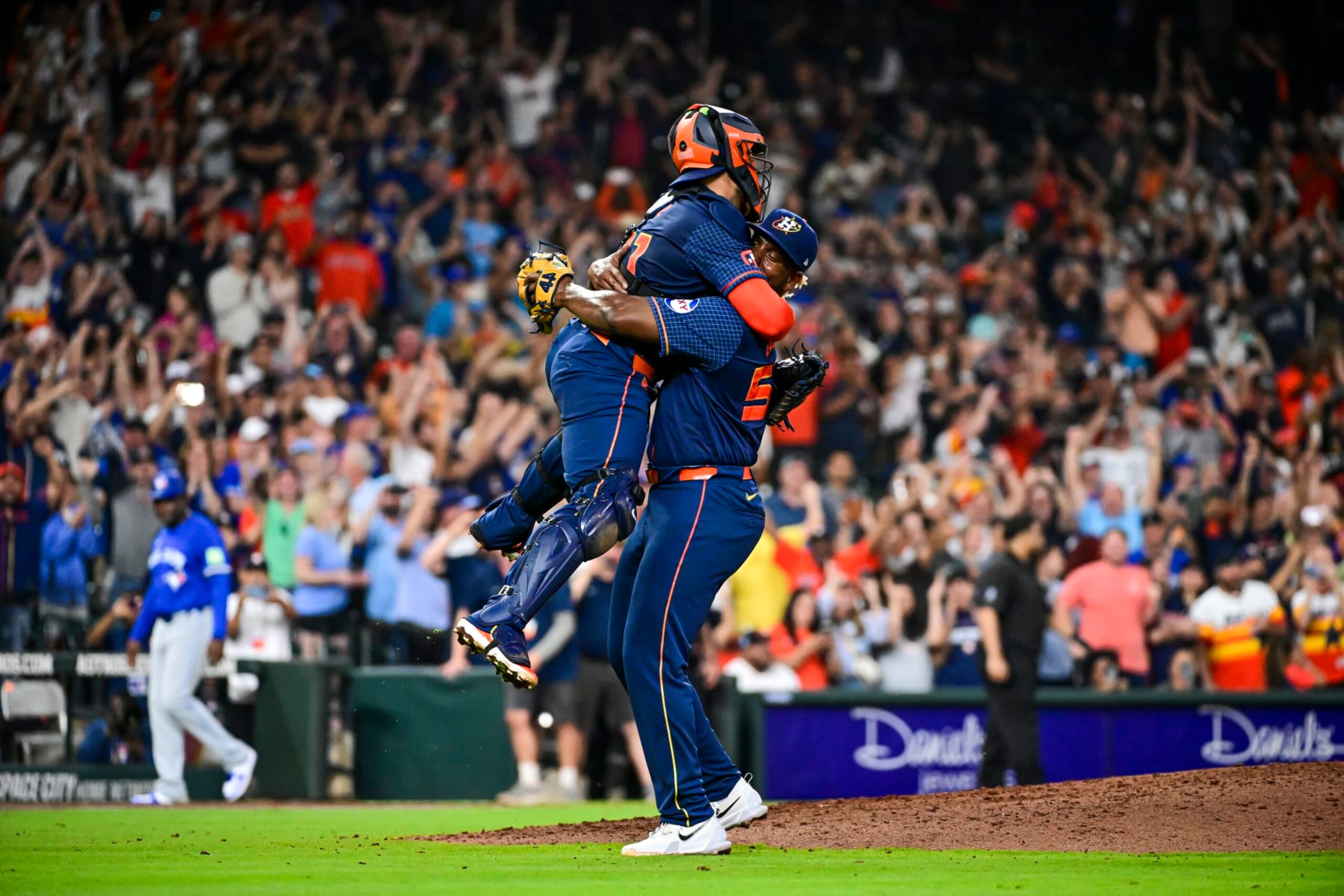 HOUSTON, TEXAS - APRIL 01: Ronel Blanco #56 celebrates with Yainer Diaz #21 of the Houston Astros after pitching a no hitter against the Toronto Blue Jays at Minute Maid Park on April 01, 2024 in Houston, Texas. (Photo by Logan Riely/Getty Images)