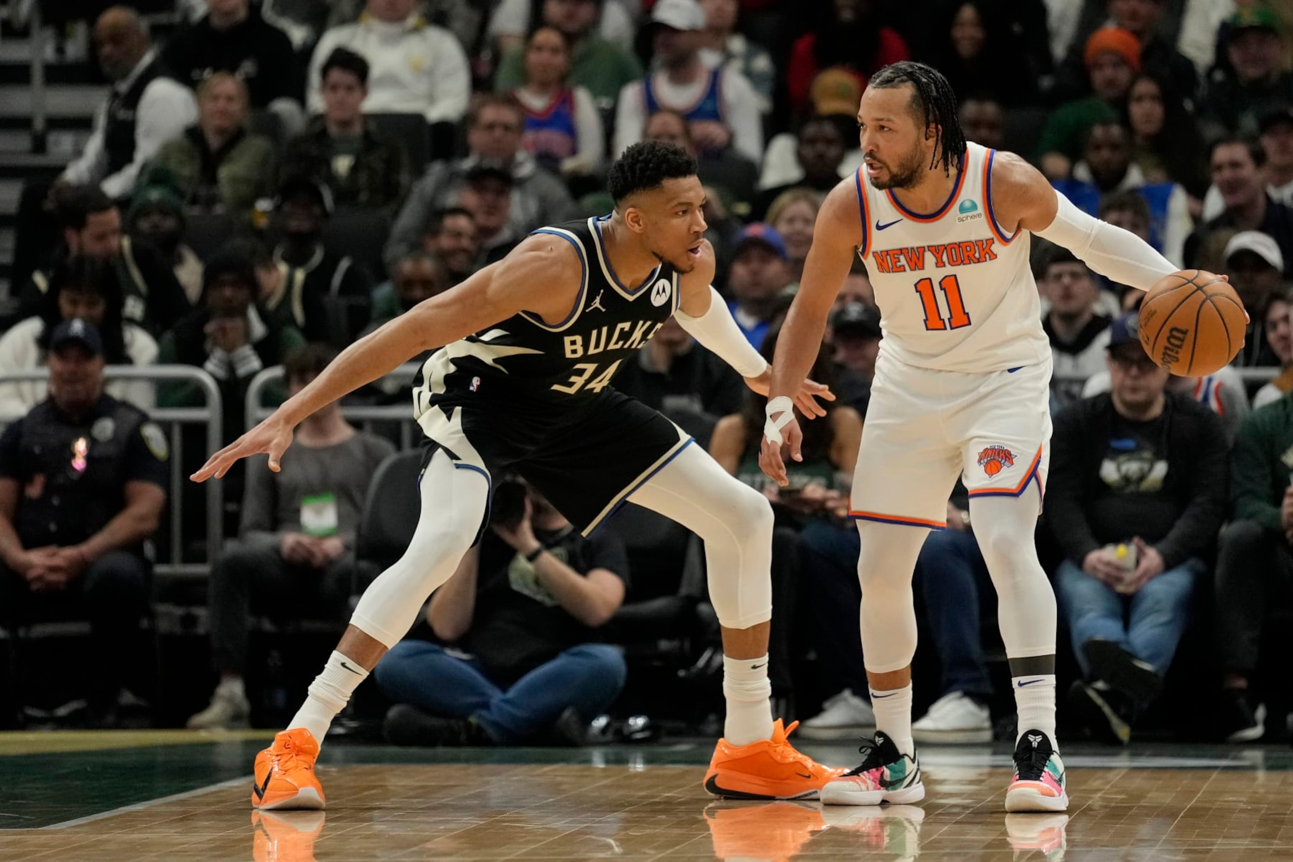 MILWAUKEE, WISCONSIN - APRIL 07: Jalen Brunson #11 of the New York Knicks dribbles the ball against Giannis Antetokounmpo #34 of the Milwaukee Bucks during the first half at Fiserv Forum on April 07, 2024 in Milwaukee, Wisconsin. NOTE TO USER: User expressly acknowledges and agrees that, by downloading and or using this photograph, User is consenting to the terms and conditions of the Getty Images License Agreement. (Photo by Patrick McDermott/Getty Images) MILWAUKEE, WISCONSIN - APRIL 07: Jalen Brunson #11 of the New York Knicks dribbles the ball against Giannis Antetokounmpo #34 of the Milwaukee Bucks during the first half at Fiserv Forum on April 07, 2024 in Milwaukee, Wisconsin. NOTE TO USER: User expressly acknowledges and agrees that, by downloading and or using this photograph, User is consenting to the terms and conditions of the Getty Images License Agreement. (Photo by Patrick McDermott/Getty Images)
