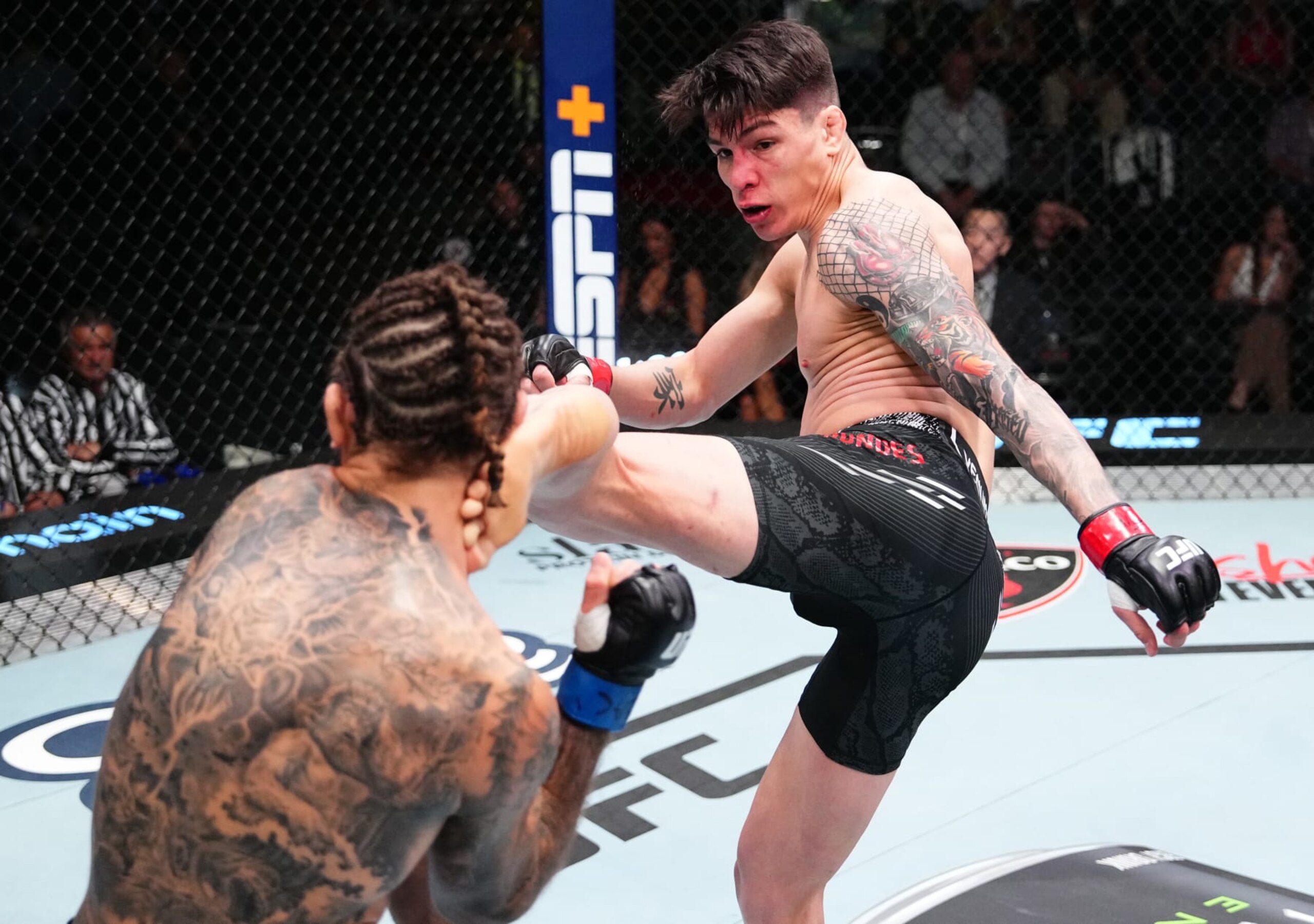 Ignacio Bahamondes kicks Christos Giagos