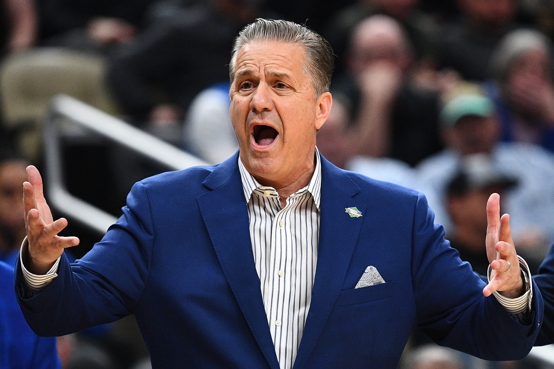 PITTSBURGH, PENNSYLVANIA - MARCH 21: Head coach John Calipari of the Kentucky Wildcats reacts to a call during the first half of a game against the Oakland Golden Grizzlies in the first round of the NCAA Men's Basketball Tournament at PPG PAINTS Arena on March 21, 2024 in Pittsburgh, Pennsylvania. (Photo by Joe Sargent/Getty Images)