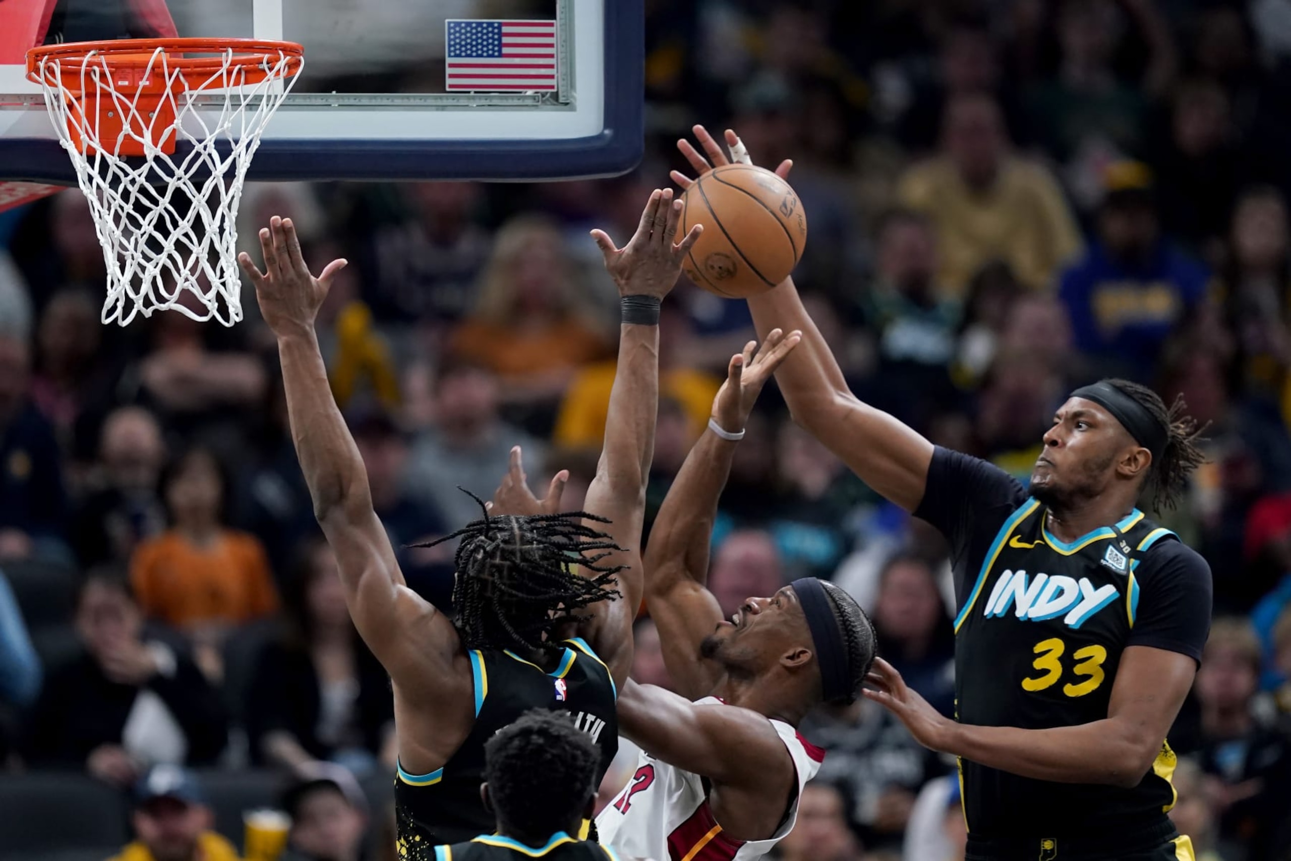 INDIANAPOLIS, INDIANA - APRIL 07: Myles Turner #33 of the Indiana Pacers blocks a shot attempt by Jimmy Butler #22 of the Miami Heat in the third quarter at Gainbridge Fieldhouse on April 07, 2024 in Indianapolis, Indiana. NOTE TO USER: User expressly acknowledges and agrees that, by downloading and or using this photograph, User is consenting to the terms and conditions of the Getty Images License Agreement. (Photo by Dylan Buell/Getty Images) INDIANAPOLIS, INDIANA - APRIL 07: Myles Turner #33 of the Indiana Pacers blocks a shot attempt by Jimmy Butler #22 of the Miami Heat in the third quarter at Gainbridge Fieldhouse on April 07, 2024 in Indianapolis, Indiana. NOTE TO USER: User expressly acknowledges and agrees that, by downloading and or using this photograph, User is consenting to the terms and conditions of the Getty Images License Agreement. (Photo by Dylan Buell/Getty Images)