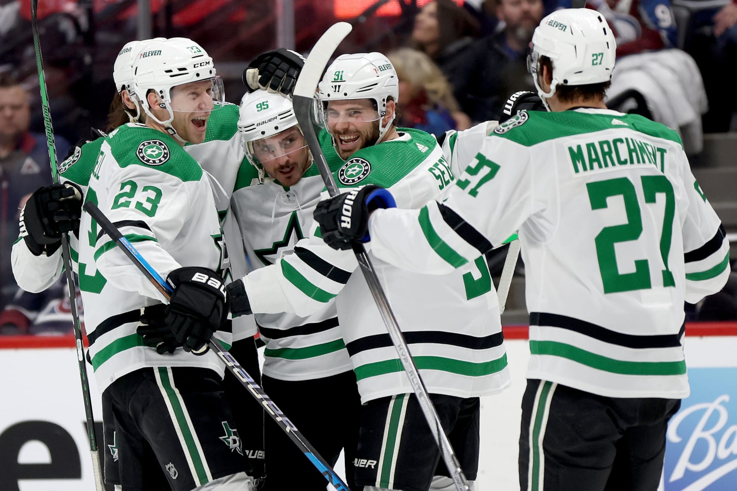 DENVER, COLORADO - APRIL 07: Matt Duchene #95 of the Dallas Stars celebrates with Chris Tanev #3, Esa Lindell #23, Tyler Seguin #91, and Mason Marchment #27 after scoring against the Colorado Avalanche during the first period at Ball Arena on April 07, 2024 in Denver, Colorado. (Photo by Matthew Stockman/Getty Images)