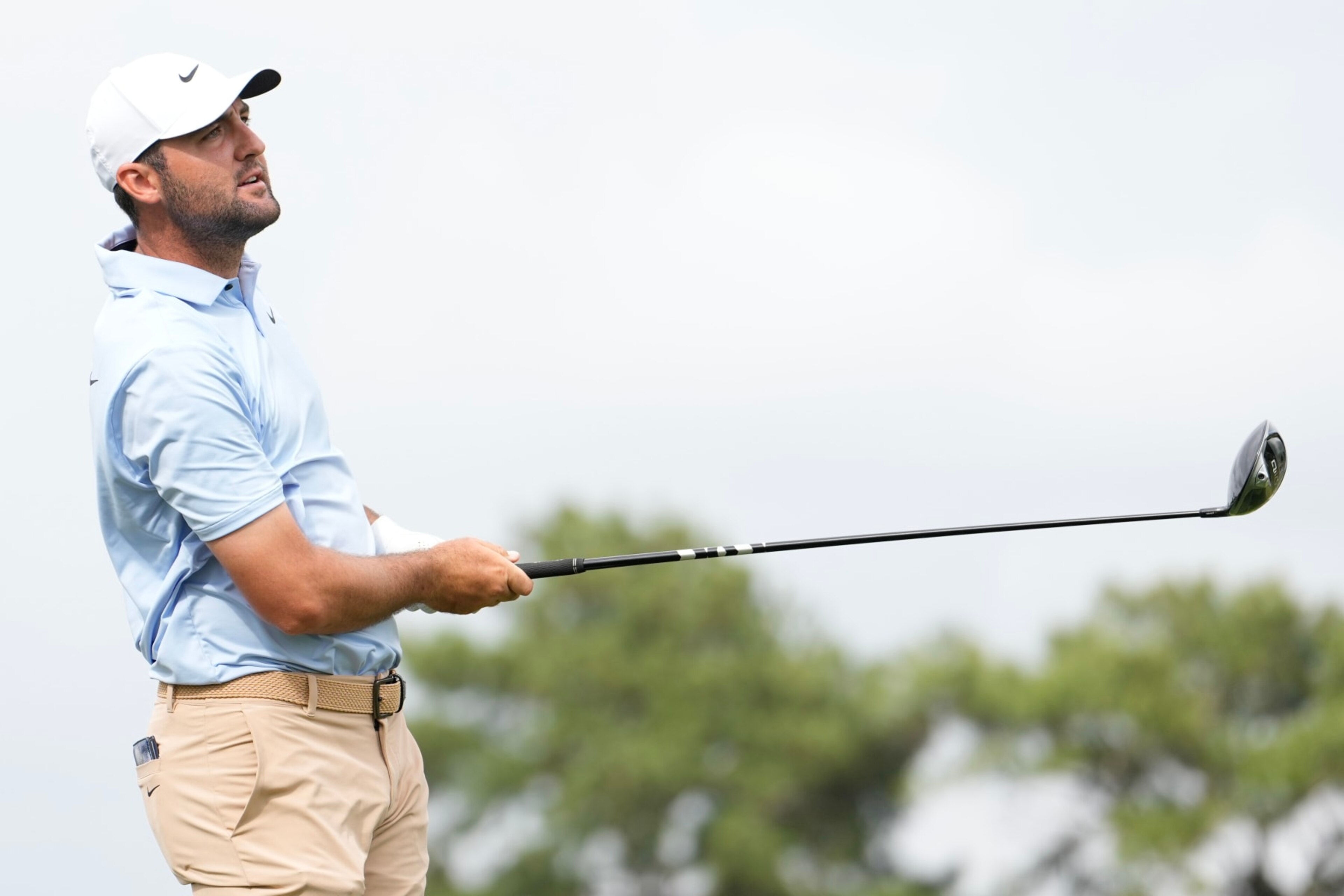 HOUSTON, TEXAS - MARCH 31: Scottie Scheffler of the United States hits a tee shot on the 17th hole during the final round of the Texas Children's Houston Open at Memorial Park Golf Course on March 31, 2024 in Houston, Texas. (Photo by Raj Mehta/Getty Images)