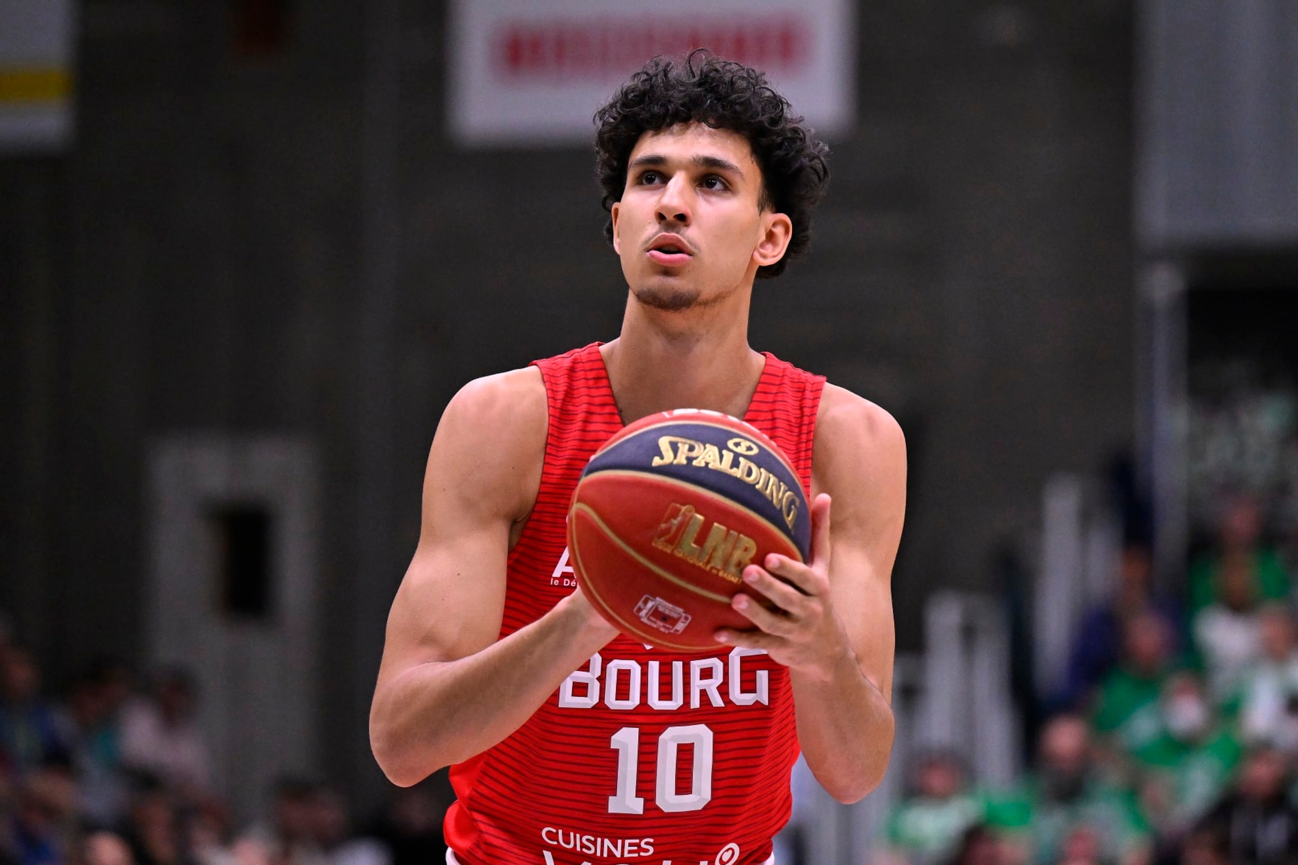 NANTERRE, FRANCE - MARCH 23: Zaccharie Risacher of Bourg En Bresse takes a free throw during the BetClic Elite basketball match between Nanterre 92 and Bourg en Bresse at Palais Des Sports Maurice Thorez on March 23, 2024 in Nanterre, France.  (Photo by Aurelien Meunier/Getty Images)