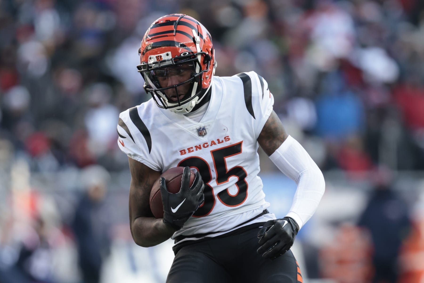 FOXBOROUGH, MASSACHUSETTS - DECEMBER 24: Tee Higgins #85 of the Cincinnati Bengals runs for yard after catch during the third quarter against the New England Patriots at Gillette Stadium on December 24, 2022 in Foxborough, Massachusetts. (Photo by Nick Grace/Getty Images)