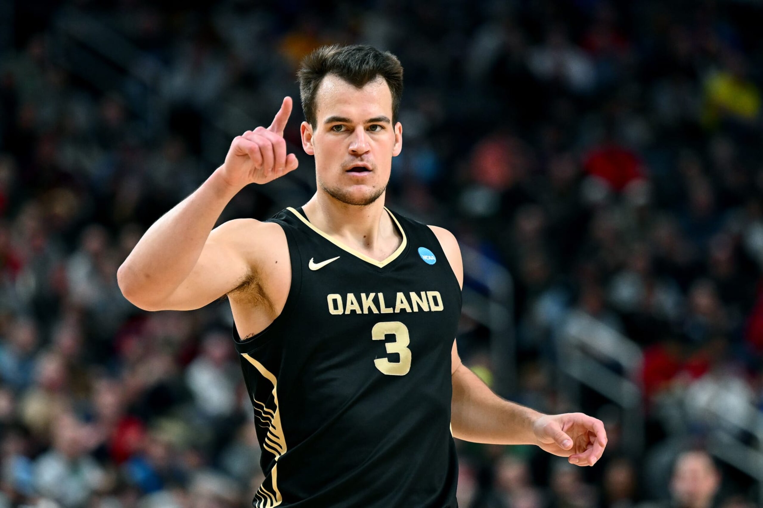 PITTSBURGH, PENNSYLVANIA - MARCH 23: Jack Gohlke #3 of the Oakland Golden Grizzlies reacts during the first half of a game against the North Carolina State Wolfpack in the second round of the NCAA Men's Basketball Tournament at PPG PAINTS Arena on March 23, 2024 in Pittsburgh, Pennsylvania. (Photo by Joe Sargent/Getty Images) PITTSBURGH, PENNSYLVANIA - MARCH 23: Jack Gohlke #3 of the Oakland Golden Grizzlies reacts during the first half of a game against the North Carolina State Wolfpack in the second round of the NCAA Men's Basketball Tournament at PPG PAINTS Arena on March 23, 2024 in Pittsburgh, Pennsylvania. (Photo by Joe Sargent/Getty Images)