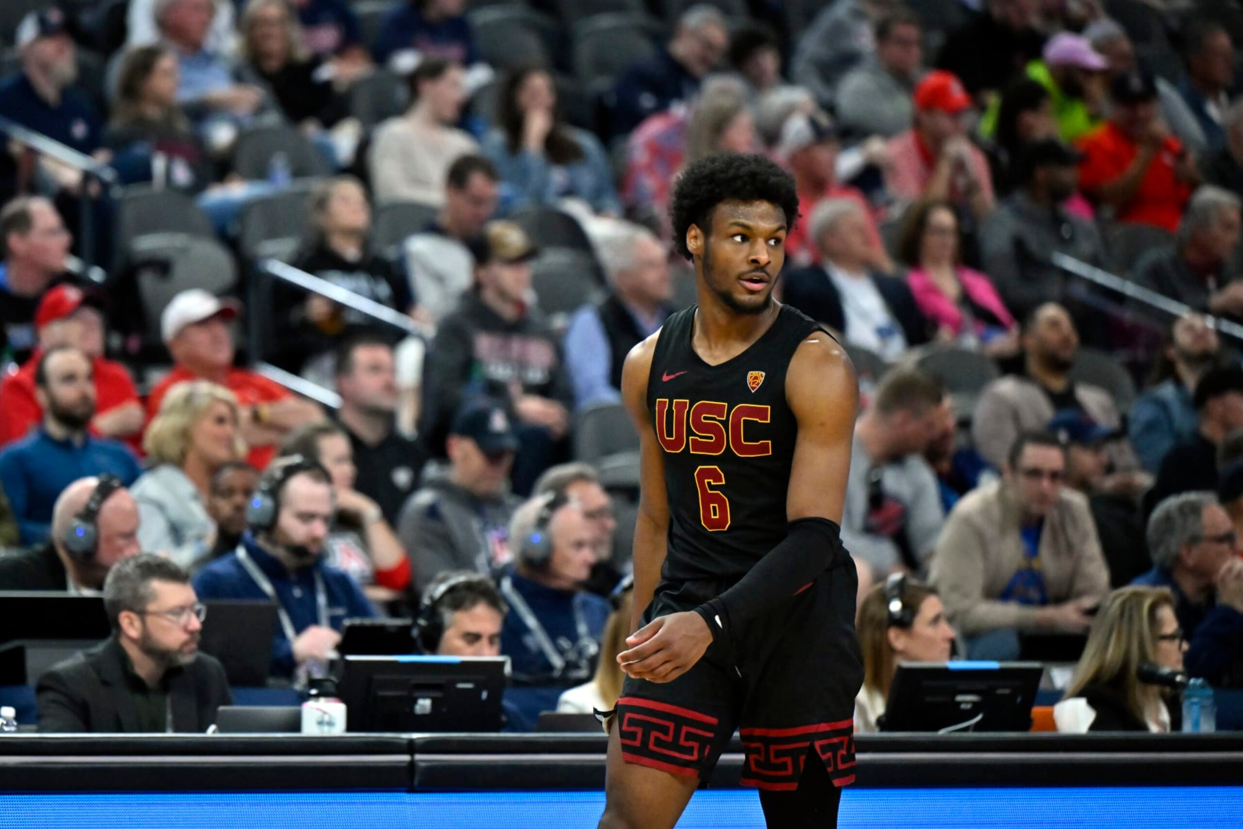 LAS VEGAS, NEVADA - MARCH 14: Bronny James #6 of the USC Trojans looks on in the second half of a quarterfinal game against the Arizona Wildcats during the Pac-12 Conference basketball tournament at T-Mobile Arena on March 14, 2024 in Las Vegas, Nevada. The Wildcats defeated the Trojans 70-49. (Photo by David Becker/Getty Images)