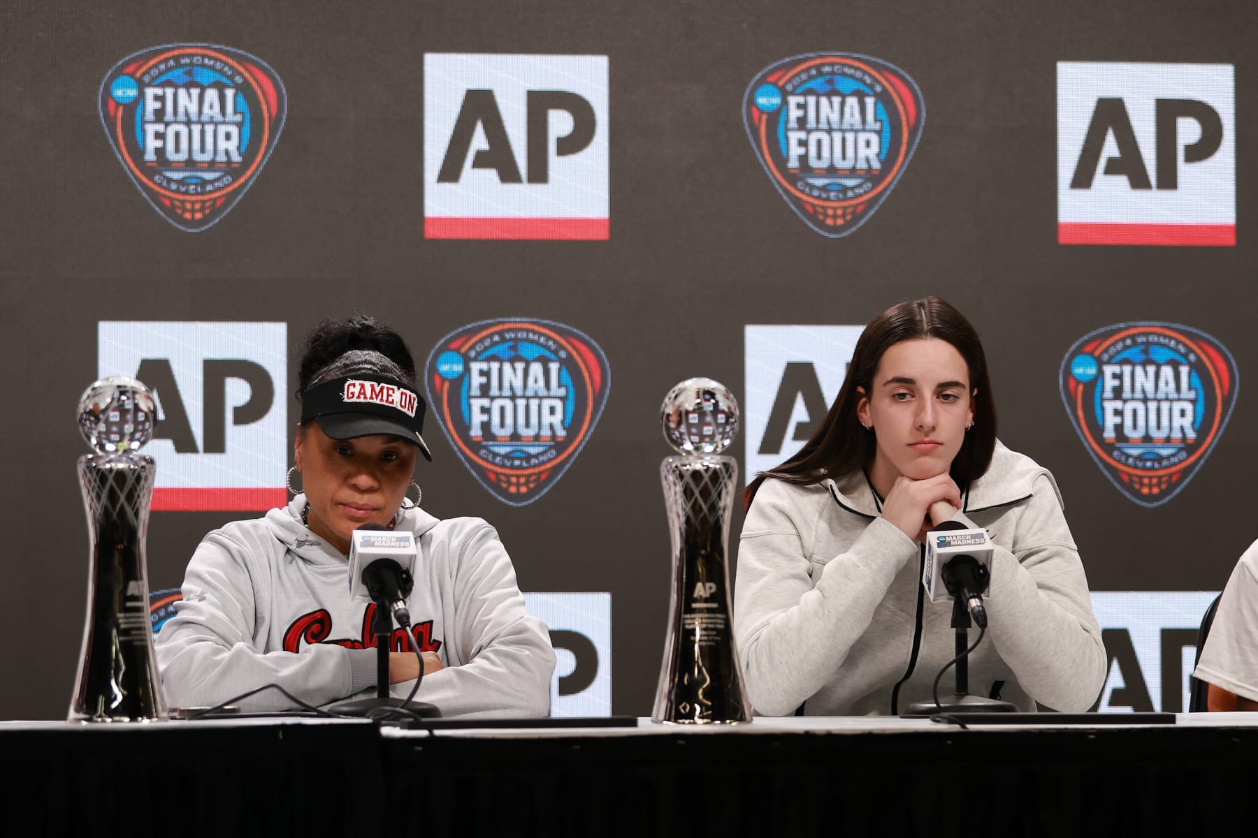 CLEVELAND, OHIO - APRIL 04: AP Coach of the Year Dawn Staley of the South Carolina Gamecocks and AP Player of the Year Caitlin Clark #22 of the Iowa Hawkeyes speak during the award press conference ahead of the 2024 NCAA Women's Basketball Tournament Final Four at Rocket Mortgage Fieldhouse on April 04, 2024 in Cleveland, Ohio. (Photo by Gregory Shamus/Getty Images)