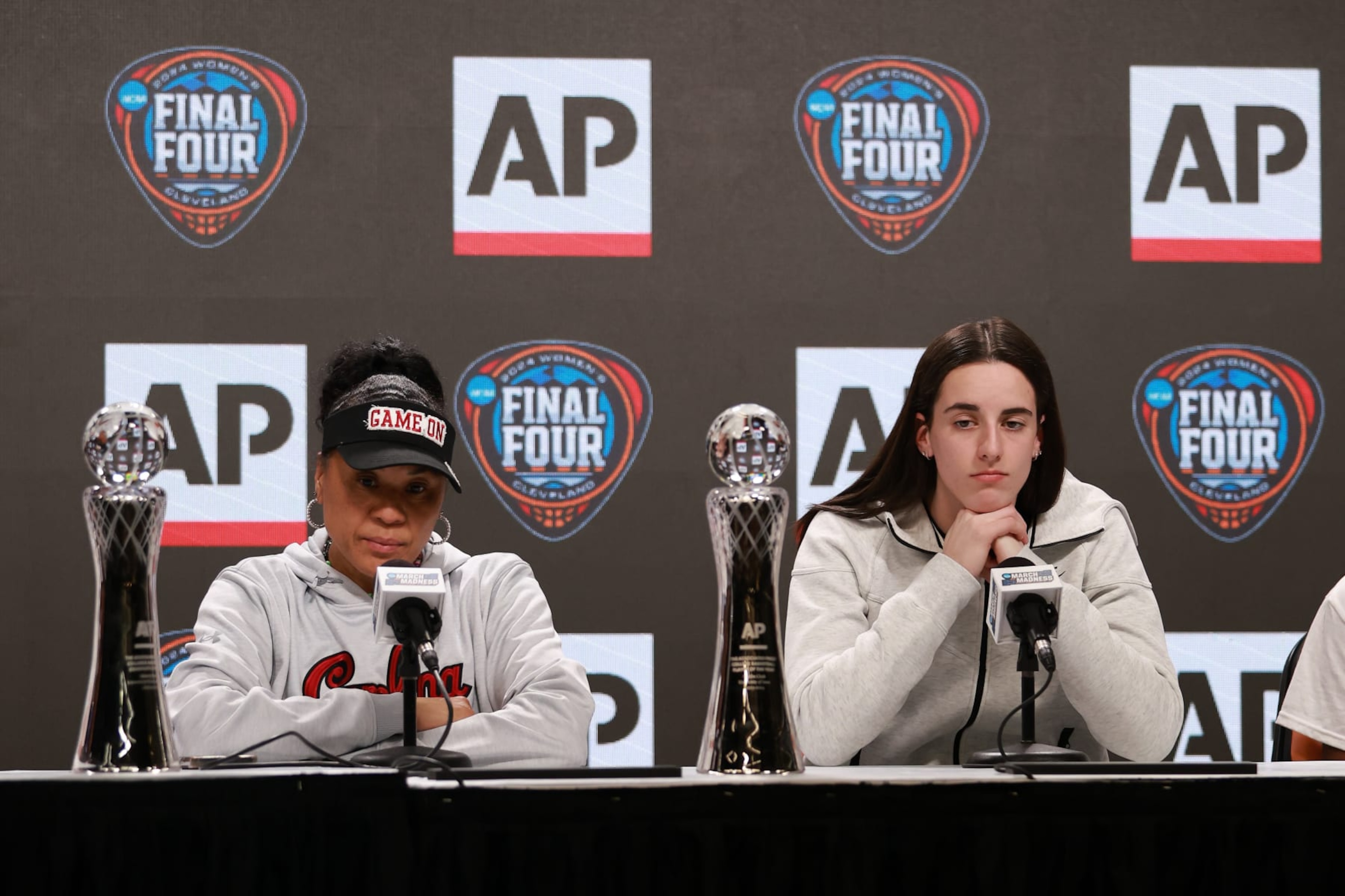 CLEVELAND, OHIO - APRIL 04: AP Coach of the Year Dawn Staley of the South Carolina Gamecocks and AP Player of the Year Caitlin Clark #22 of the Iowa Hawkeyes speak during the award press conference ahead of the 2024 NCAA Women's Basketball Tournament Final Four at Rocket Mortgage Fieldhouse on April 04, 2024 in Cleveland, Ohio. (Photo by Gregory Shamus/Getty Images) CLEVELAND, OHIO - APRIL 04: AP Coach of the Year Dawn Staley of the South Carolina Gamecocks and AP Player of the Year Caitlin Clark #22 of the Iowa Hawkeyes speak during the award press conference ahead of the 2024 NCAA Women's Basketball Tournament Final Four at Rocket Mortgage Fieldhouse on April 04, 2024 in Cleveland, Ohio. (Photo by Gregory Shamus/Getty Images)