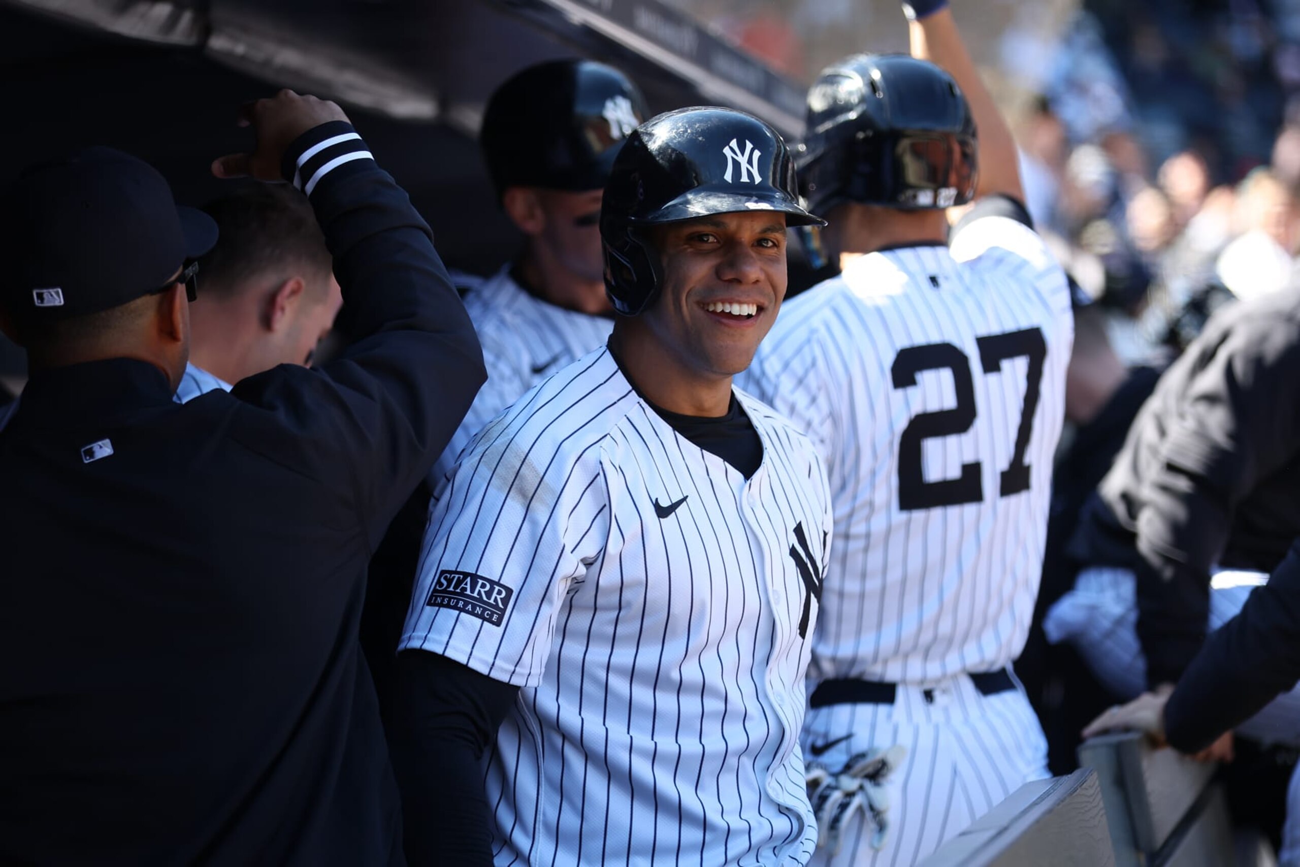NEW YORK, NY - APRIL 7: Juan Soto #22 of the New York Yankees smiles from the dugout during the game against the Toronto Blue Jays at Yankee Stadium on April 7, 2024, in New York, New York. (Photo by New York Yankees/Getty Images)