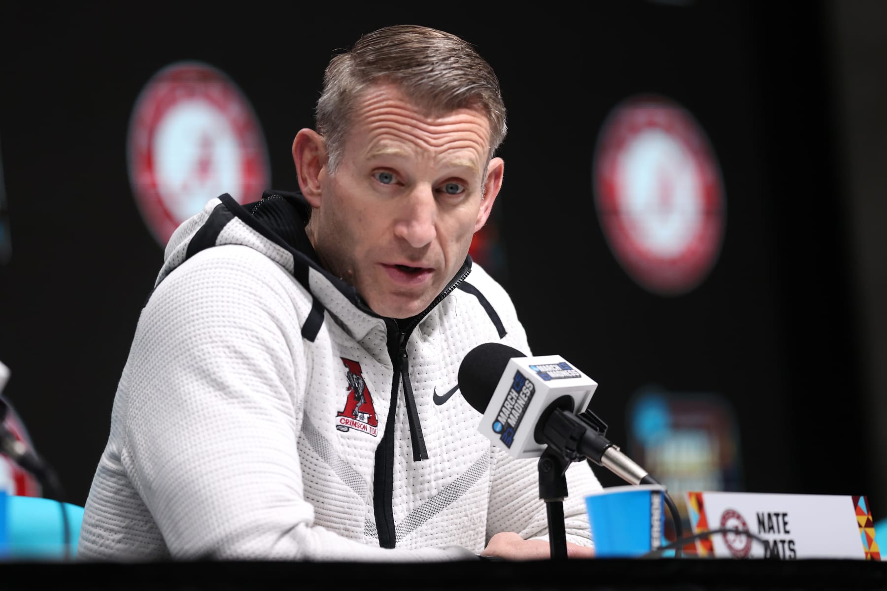 GLENDALE, ARIZONA - APRIL 05: Head coach Nate Oats of the Alabama Crimson Tide answers questions during a media session at State Farm Stadium on April 05, 2024 in Glendale, Arizona. (Photo by Christian Petersen/Getty Images)