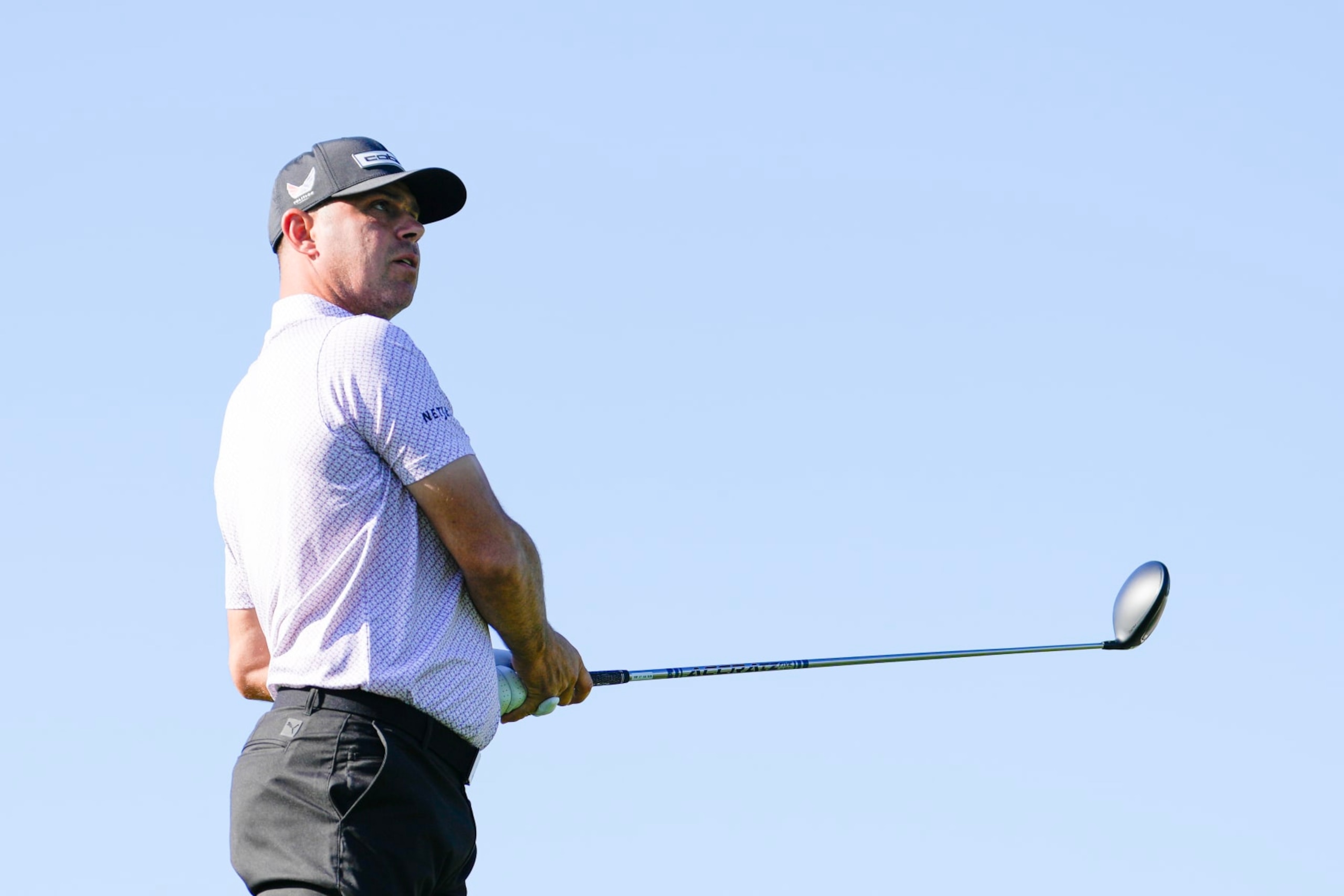 HOUSTON, TEXAS - MARCH 28: Gary Woodland of the United States hits a tee shot on the fifth hole during the first round of the Texas Children's Houston Open at Memorial Park Golf Course on March 28, 2024 in Houston, Texas. (Photo by Raj Mehta/Getty Images)