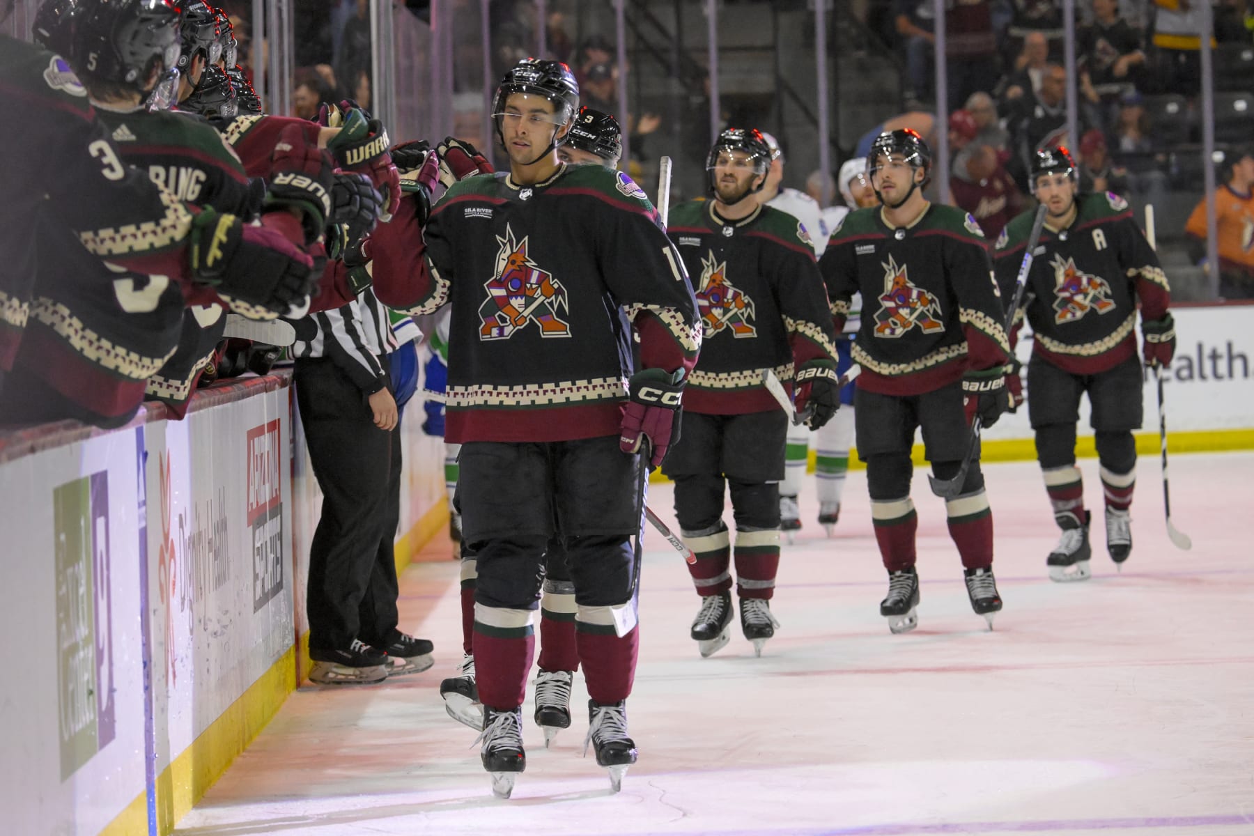 TEMPE, AZ - APRIL 03: Arizona Coyotes Right Wing Dylan Guenther (11) celebrates his goal during the third period of an NHL game between the Arizona Coyotes and Vancouver Canucks on April 3, 2024, at Mullett Arena in Tempe, AZ. (Photo by Nick Wosika/Icon Sportswire via Getty Images)