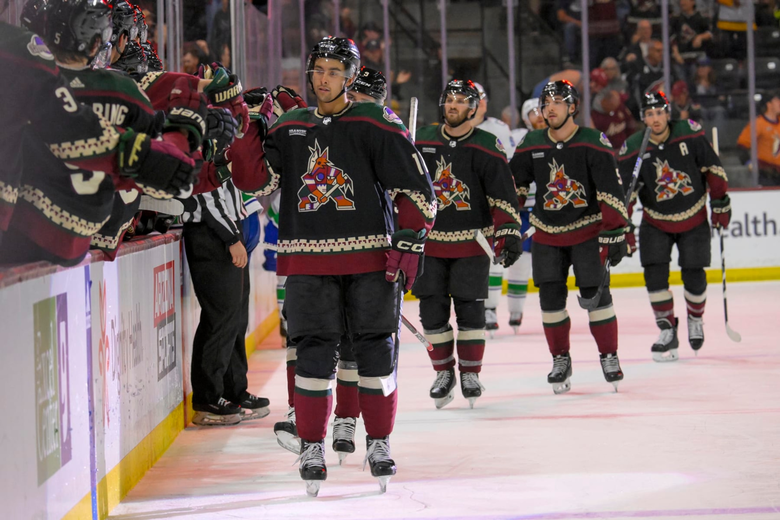 TEMPE, AZ - APRIL 03: Arizona Coyotes Right Wing Dylan Guenther (11) celebrates his goal during the third period of an NHL game between the Arizona Coyotes and Vancouver Canucks on April 3, 2024, at Mullett Arena in Tempe, AZ. (Photo by Nick Wosika/Icon Sportswire via Getty Images) TEMPE, AZ - APRIL 03: Arizona Coyotes Right Wing Dylan Guenther (11) celebrates his goal during the third period of an NHL game between the Arizona Coyotes and Vancouver Canucks on April 3, 2024, at Mullett Arena in Tempe, AZ. (Photo by Nick Wosika/Icon Sportswire via Getty Images)