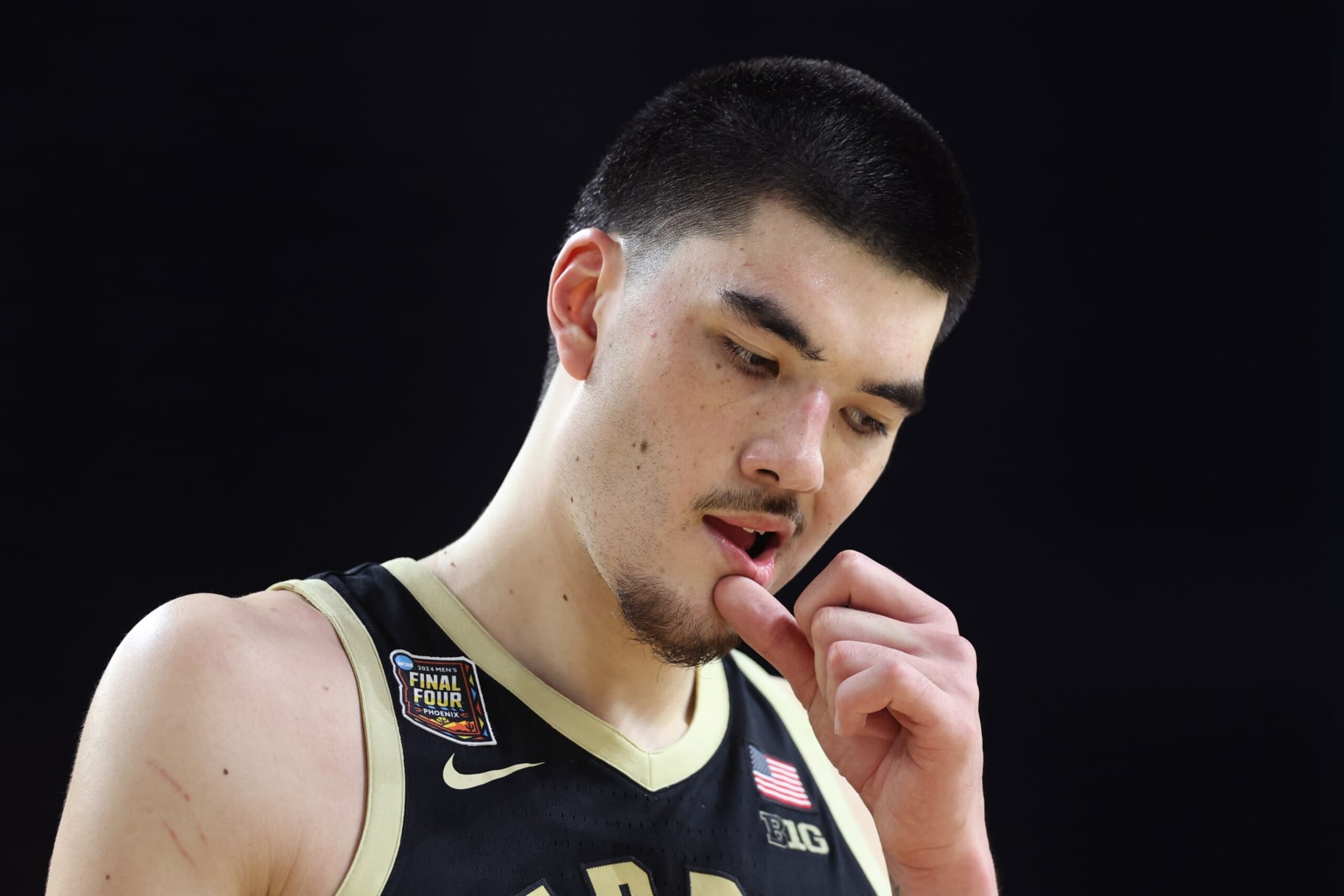 GLENDALE, ARIZONA - APRIL 08: Zach Edey #15 of the Purdue Boilermakers walks across the court in the second half against the Connecticut Huskies during the NCAA Men's Basketball Tournament National Championship game at State Farm Stadium on April 08, 2024 in Glendale, Arizona. (Photo by Christian Petersen/Getty Images) GLENDALE, ARIZONA - APRIL 08: Zach Edey #15 of the Purdue Boilermakers walks across the court in the second half against the Connecticut Huskies during the NCAA Men's Basketball Tournament National Championship game at State Farm Stadium on April 08, 2024 in Glendale, Arizona. (Photo by Christian Petersen/Getty Images)