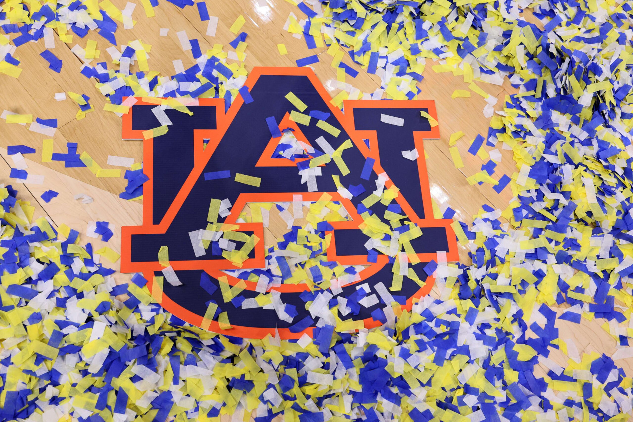 NASHVILLE, TENNESSEE - MARCH 17: Confetti covers the logo of the Auburn Tigers after their win against the Florida Gators in the championship game of the SEC Basketball Tournament at Bridgestone Arena on March 17, 2024 in Nashville, Tennessee. (Photo by Andy Lyons/Getty Images)