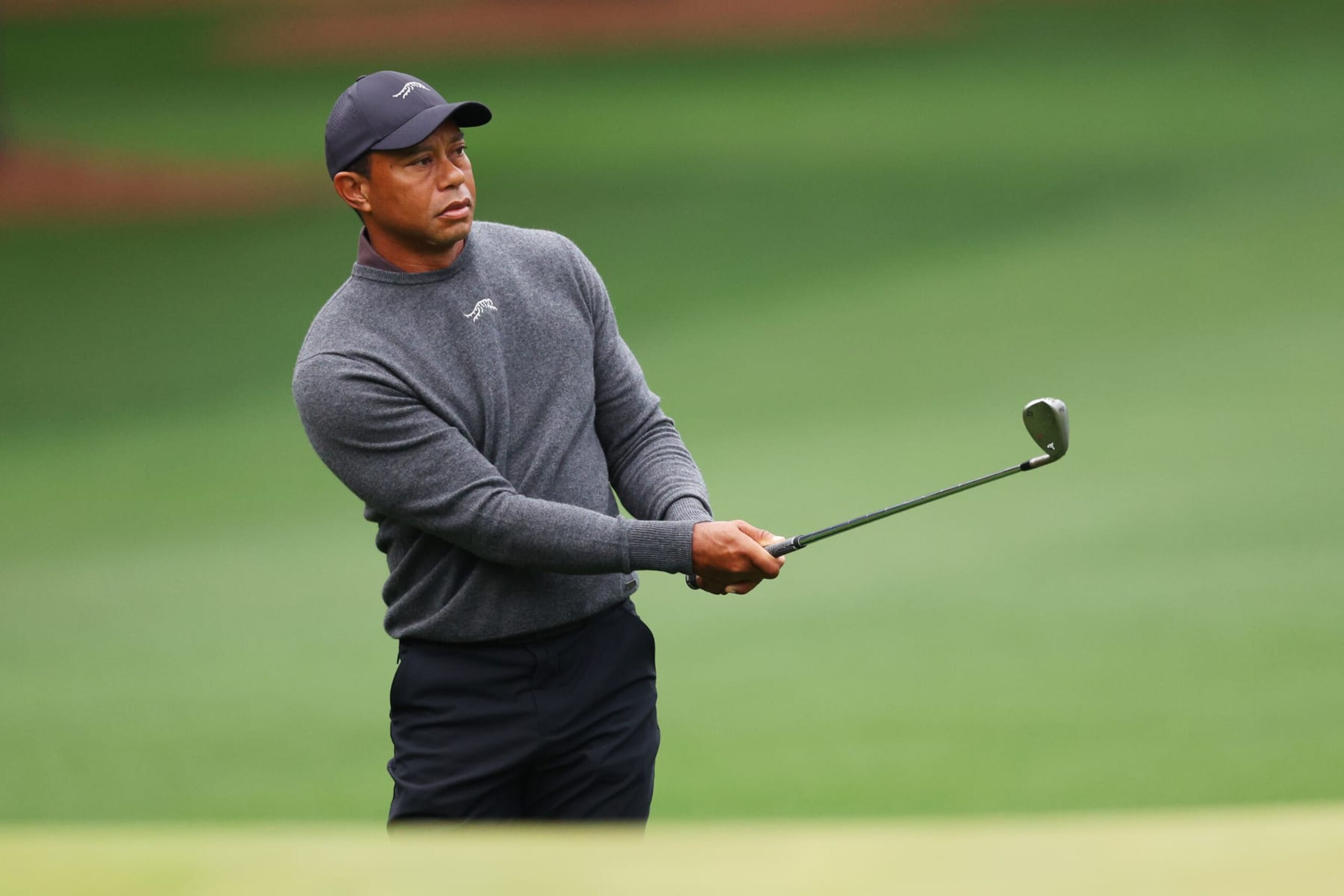 AUGUSTA, GEORGIA - APRIL 09: Tiger Woods of the United States plays a shot during a practice round prior to the 2024 Masters Tournament at Augusta National Golf Club on April 09, 2024 in Augusta, Georgia. (Photo by Andrew Redington/Getty Images)