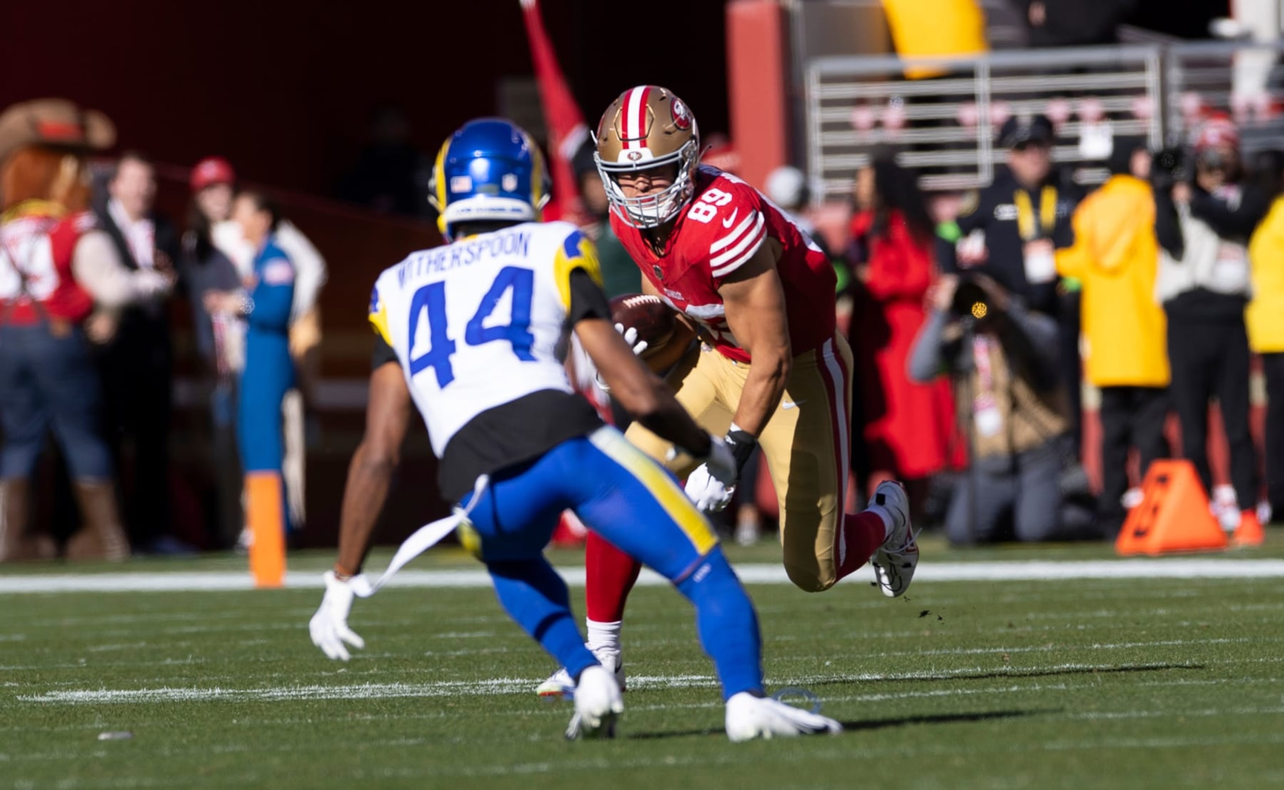 SANTA CLARA, CA - JANUARY 7: Charlie Woerner #89 of the San Francisco 49ers runs after making a catch during the game against the Los Angeles Rams at Levi's Stadium on January 7, 2024 in Santa Clara, California. The Rams defeated the 49ers 21-20. (Photo by Michael Zagaris/San Francisco 49ers/Getty Images)