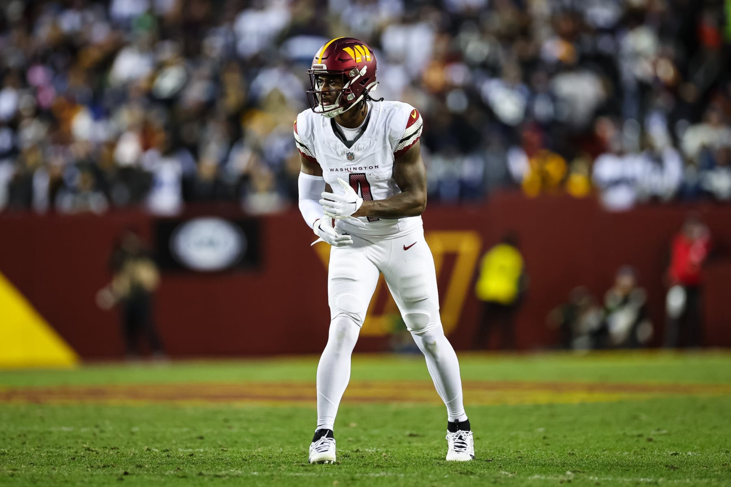 LANDOVER, MD - JANUARY 07: Curtis Samuel #4 of the Washington Commanders lines up against the Dallas Cowboys during the first half of the game at FedExField on January 7, 2024 in Landover, Maryland. (Photo by Scott Taetsch/Getty Images)