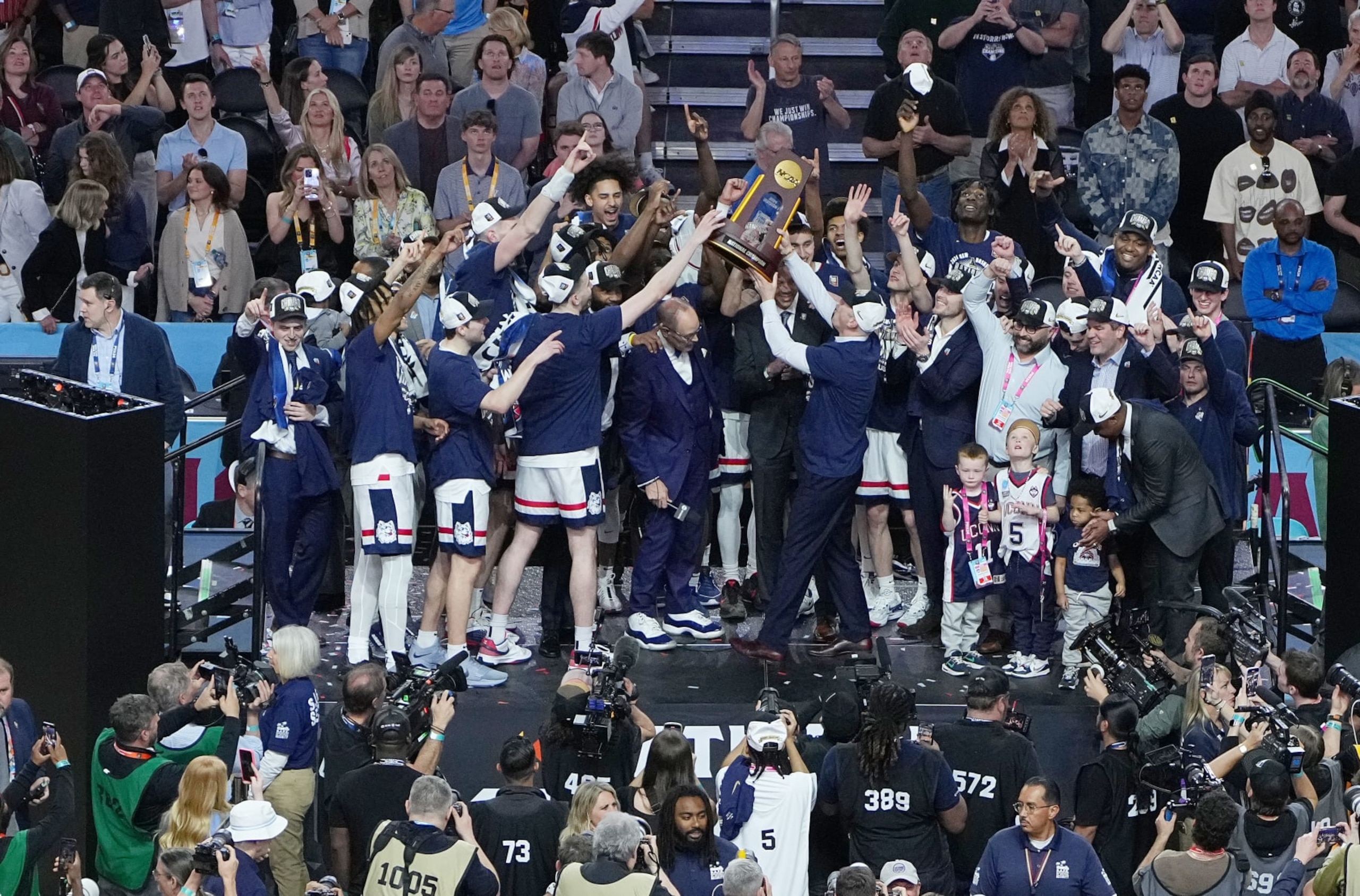 GLENDALE, ARIZONA - APRIL 08: Connecticut Huskies celebrate after defeating the Purdue Boilermakers in the NCAA Men's Basketball Tournament National Championship game at State Farm Stadium on April 08, 2024 in Glendale, Arizona. (Photo by Jack Dempsey/NCAA Photos via Getty Images) GLENDALE, ARIZONA - APRIL 08: Connecticut Huskies celebrate after defeating the Purdue Boilermakers in the NCAA Men's Basketball Tournament National Championship game at State Farm Stadium on April 08, 2024 in Glendale, Arizona. (Photo by Jack Dempsey/NCAA Photos via Getty Images)