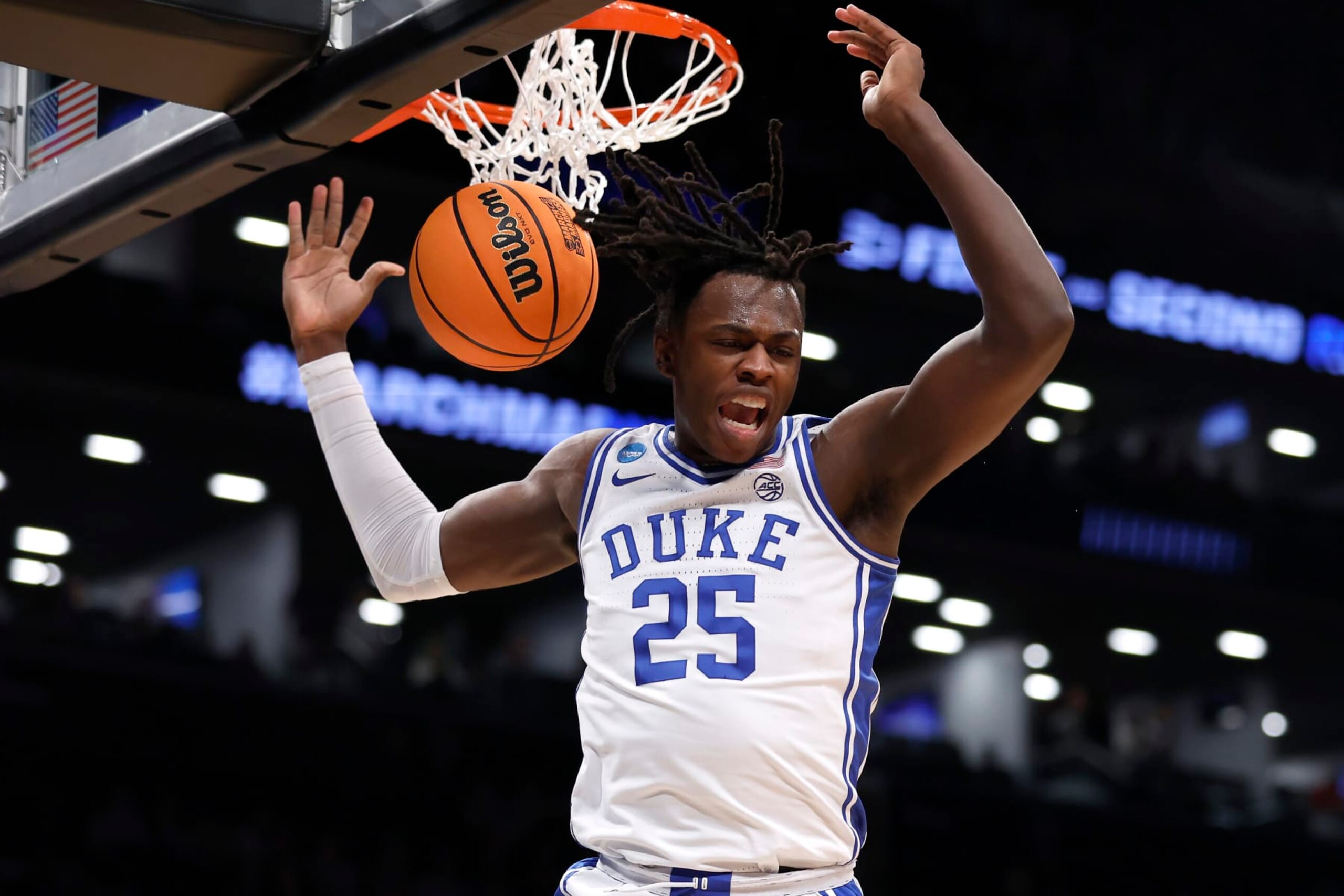 NEW YORK, NEW YORK - MARCH 22: Mark Mitchell #25 of the Duke Blue Devils reacts after dunking the ball during the first half against the Vermont Catamounts in the first round of the NCAA Men's Basketball Tournament at Barclays Center on March 22, 2024 in New York City. (Photo by Sarah Stier/Getty Images)