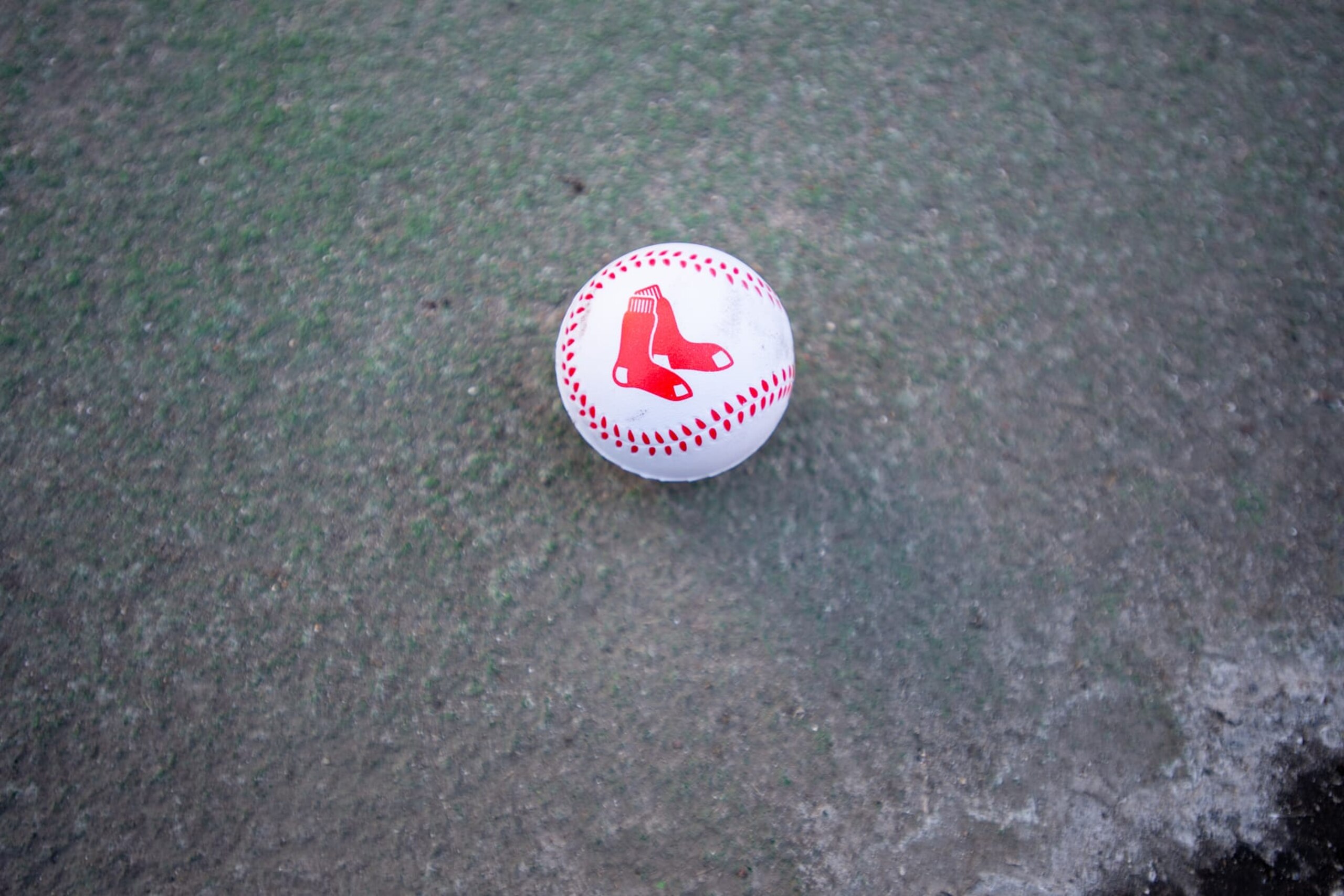 BOSTON, MA - FEBRUARY 05: A general view of a soft baseball with a Red Sox logo after being tossed into the sidewalk to fans during Boston Red Sox Truck Day on February 5, 2024, outside Fenway Park in Boston, MA. (Photo by Erica Denhoff/Icon Sportswire via Getty Images)