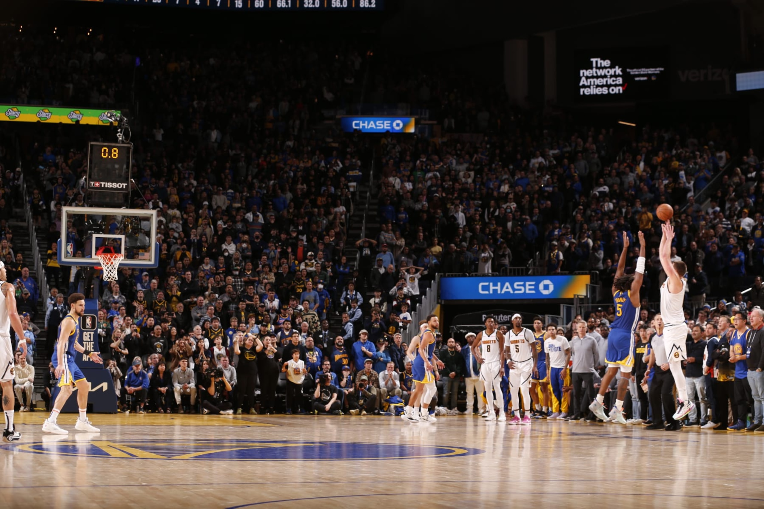 SAN FRANCISCO, CA - JANUARY 4: Nikola Jokic #15 of the Denver Nuggets shoots the game winner three point basket during the game against the Golden State Warriors on January 4, 2024 at Chase Center in San Francisco, California. NOTE TO USER: User expressly acknowledges and agrees that, by downloading and or using this photograph, user is consenting to the terms and conditions of Getty Images License Agreement. Mandatory Copyright Notice: Copyright 2024 NBAE (Photo by Jed Jacobsohn/NBAE via Getty Images) SAN FRANCISCO, CA - JANUARY 4: Nikola Jokic #15 of the Denver Nuggets shoots the game winner three point basket during the game against the Golden State Warriors on January 4, 2024 at Chase Center in San Francisco, California. NOTE TO USER: User expressly acknowledges and agrees that, by downloading and or using this photograph, user is consenting to the terms and conditions of Getty Images License Agreement. Mandatory Copyright Notice: Copyright 2024 NBAE (Photo by Jed Jacobsohn/NBAE via Getty Images)