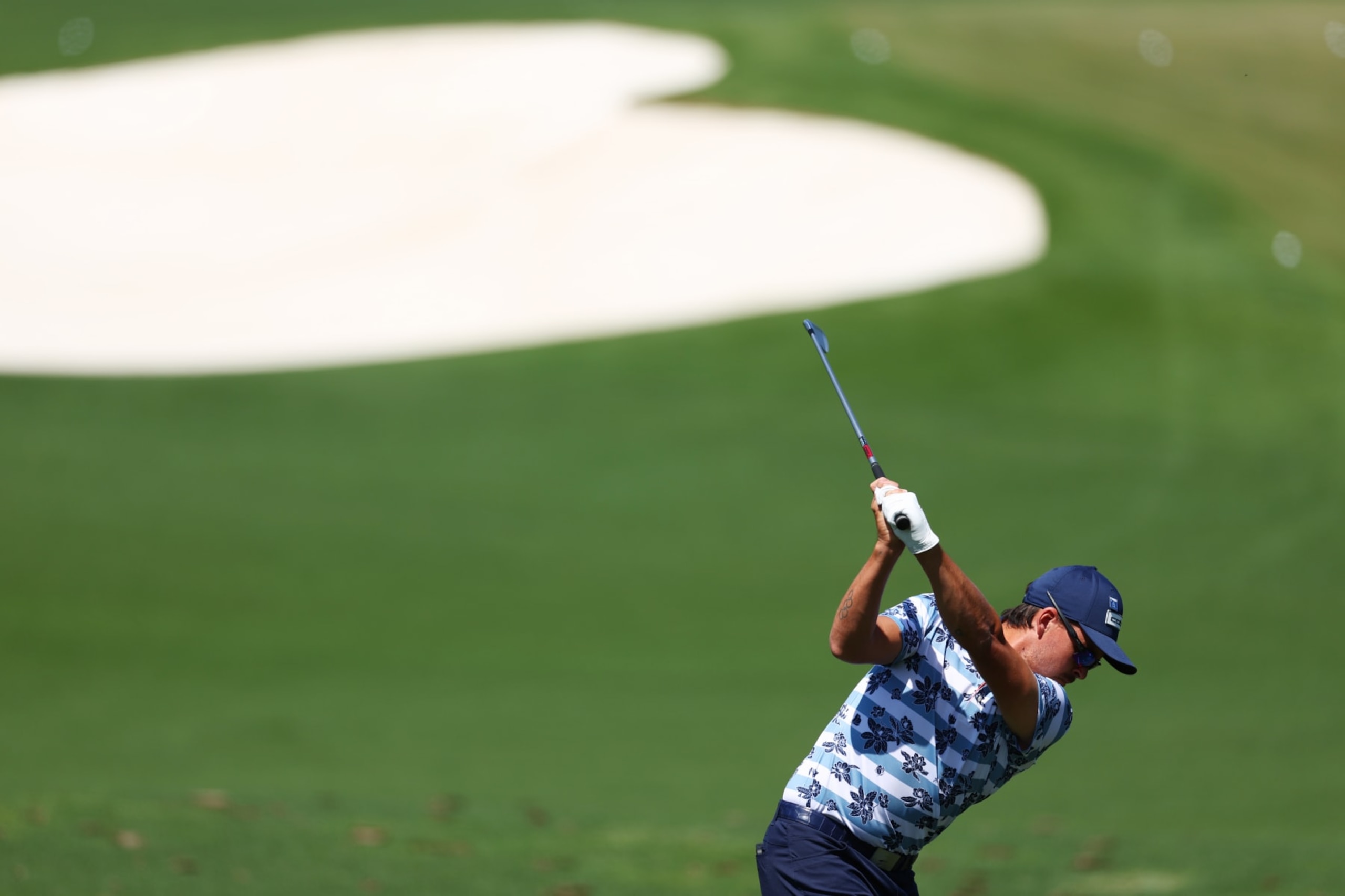 AUGUSTA, GEORGIA - APRIL 08: Rickie Fowler of the United States hits in the practice area during a practice round prior to the 2024 Masters Tournament at Augusta National Golf Club on April 08, 2024 in Augusta, Georgia. (Photo by Maddie Meyer/Getty Images)