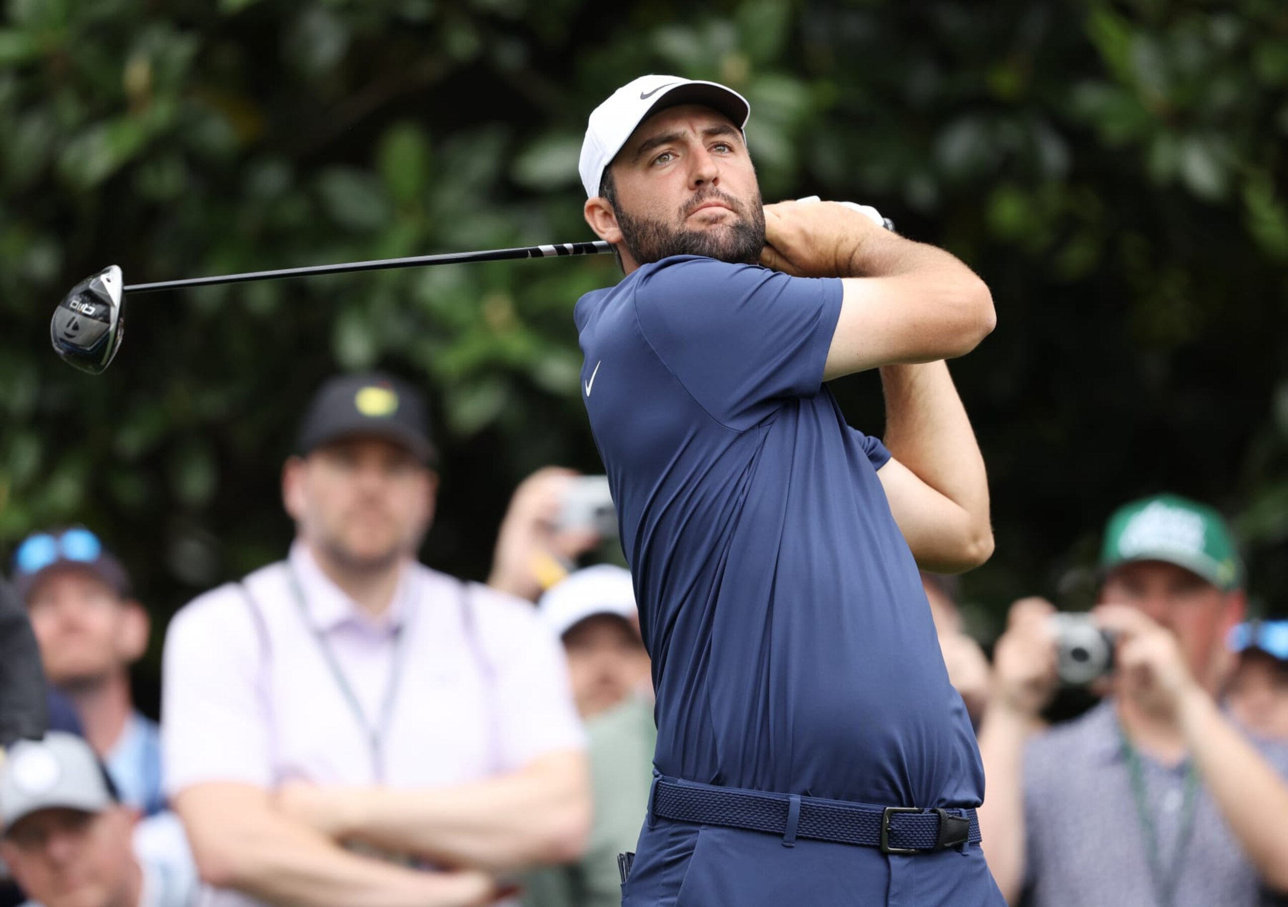 AUGUSTA, GEORGIA - APRIL 09: Scottie Scheffler of the United States plays his shot from the ninth tee during a practice round prior to the 2024 Masters Tournament at Augusta National Golf Club on April 09, 2024 in Augusta, Georgia. (Photo by Warren Little/Getty Images)