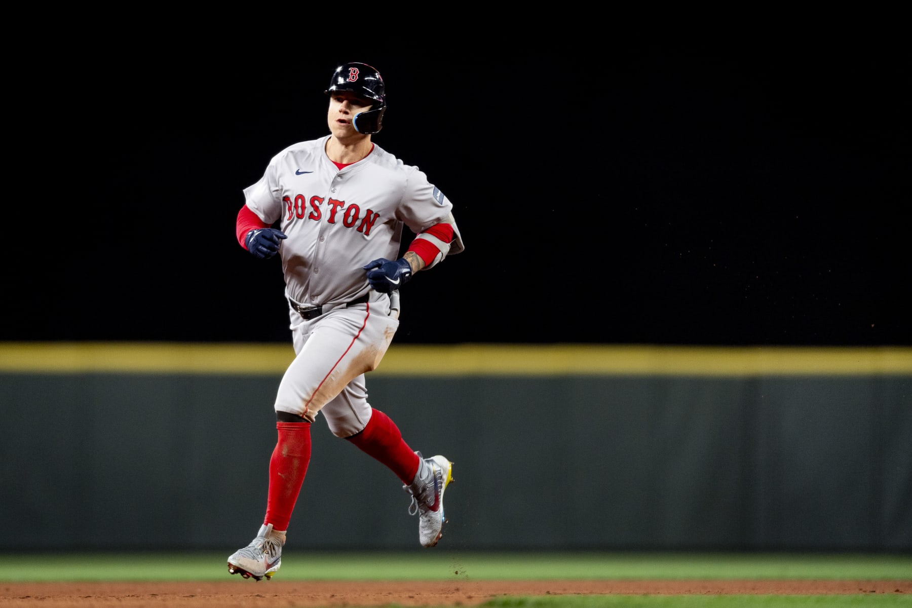 SEATTLE, WASHINGTON - MARCH 28: Tyler O'Neill #17 of the Boston Red Sox rounds the bases after hitting a home run during the eighth inning of the 2024 Opening Day game against the Seattle Mariners at T-Mobile Park on March 28, 2024 in Seattle, Washington. (Photo by Maddie Malhotra/Boston Red Sox/Getty Images)